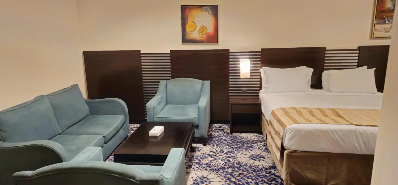 Seating area, Bed in Al Hidayah Towers Hotel