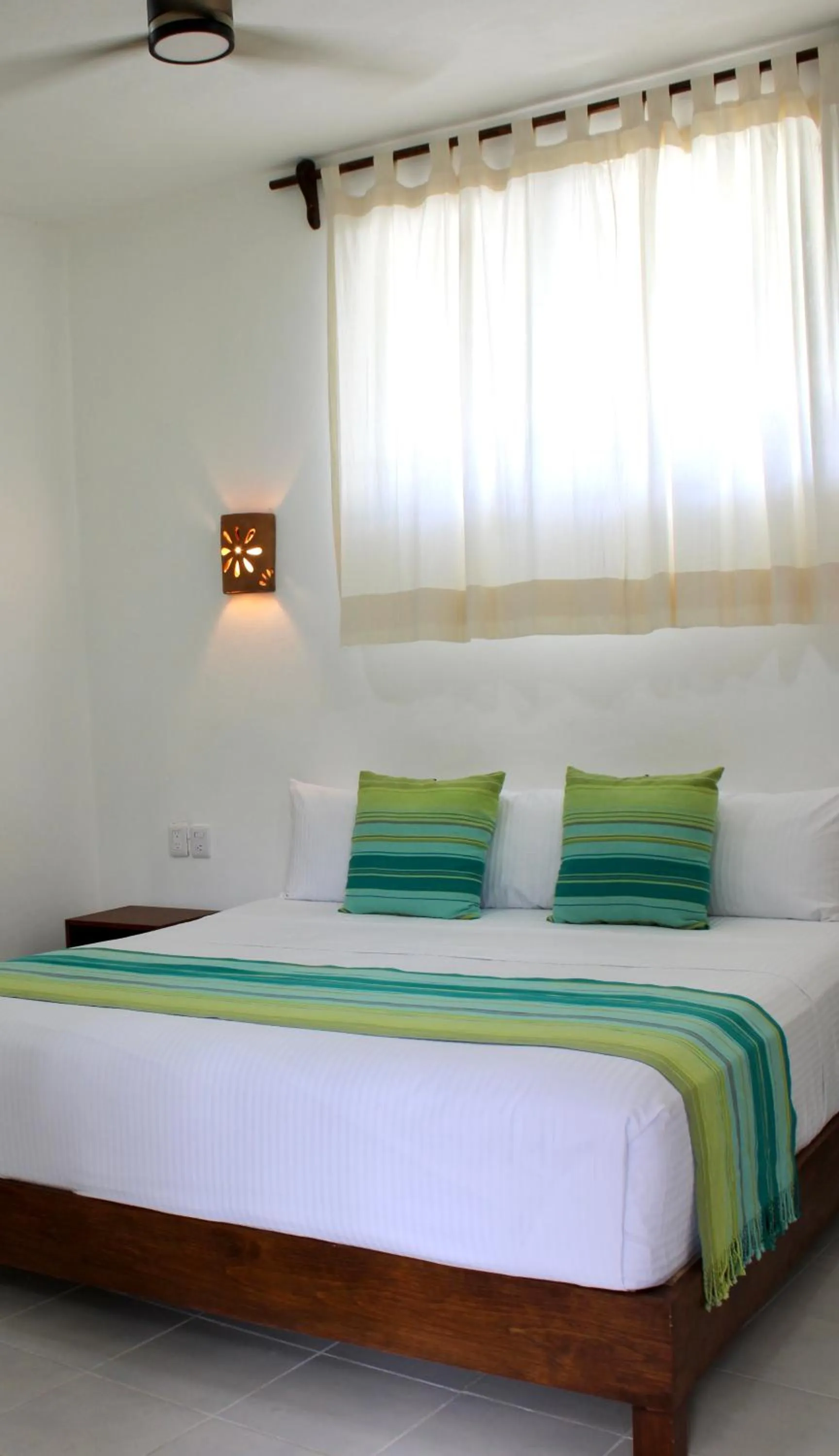 Bed in Maison Bacalar