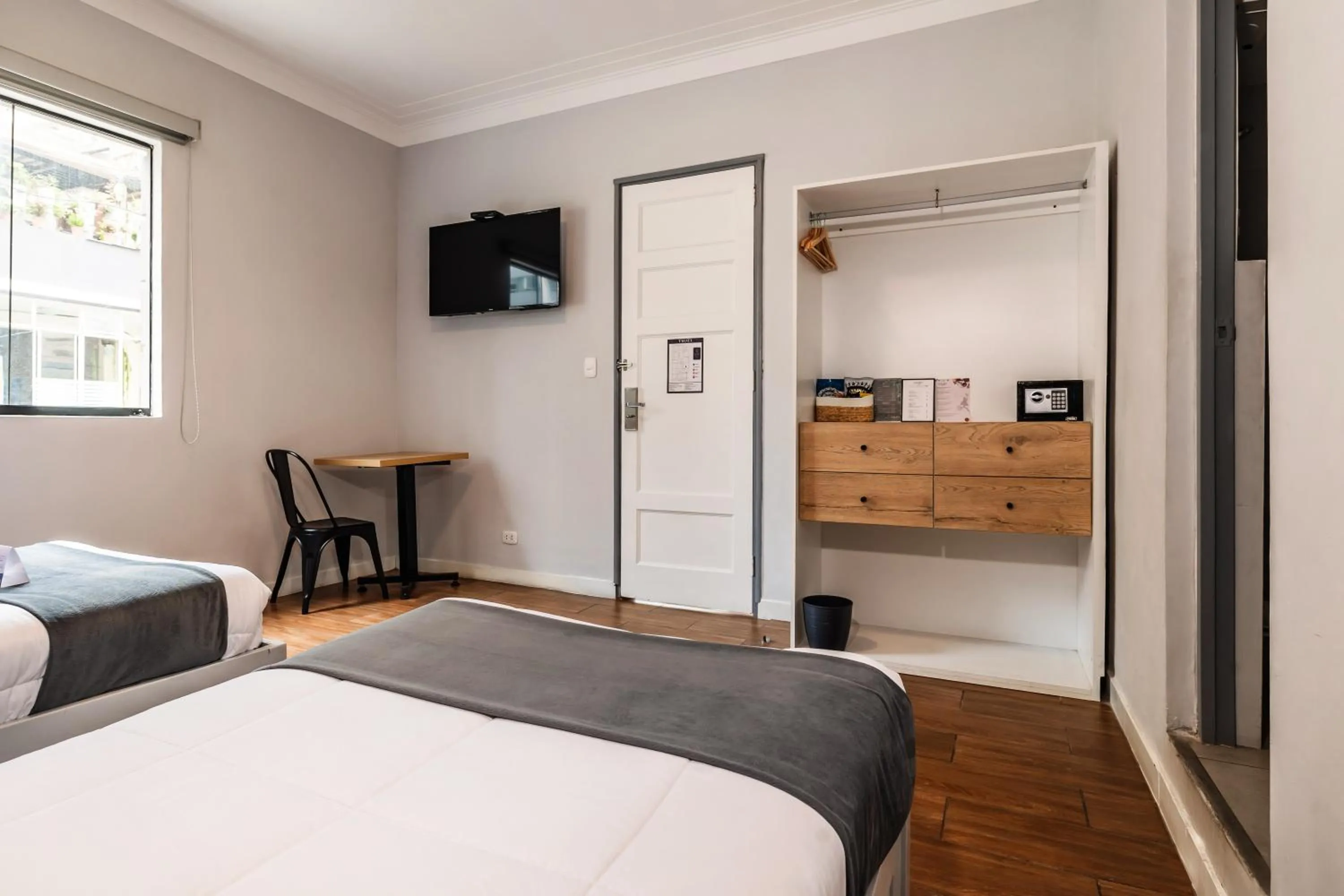 Bed in TARATA BOUTIQUE HOTEL