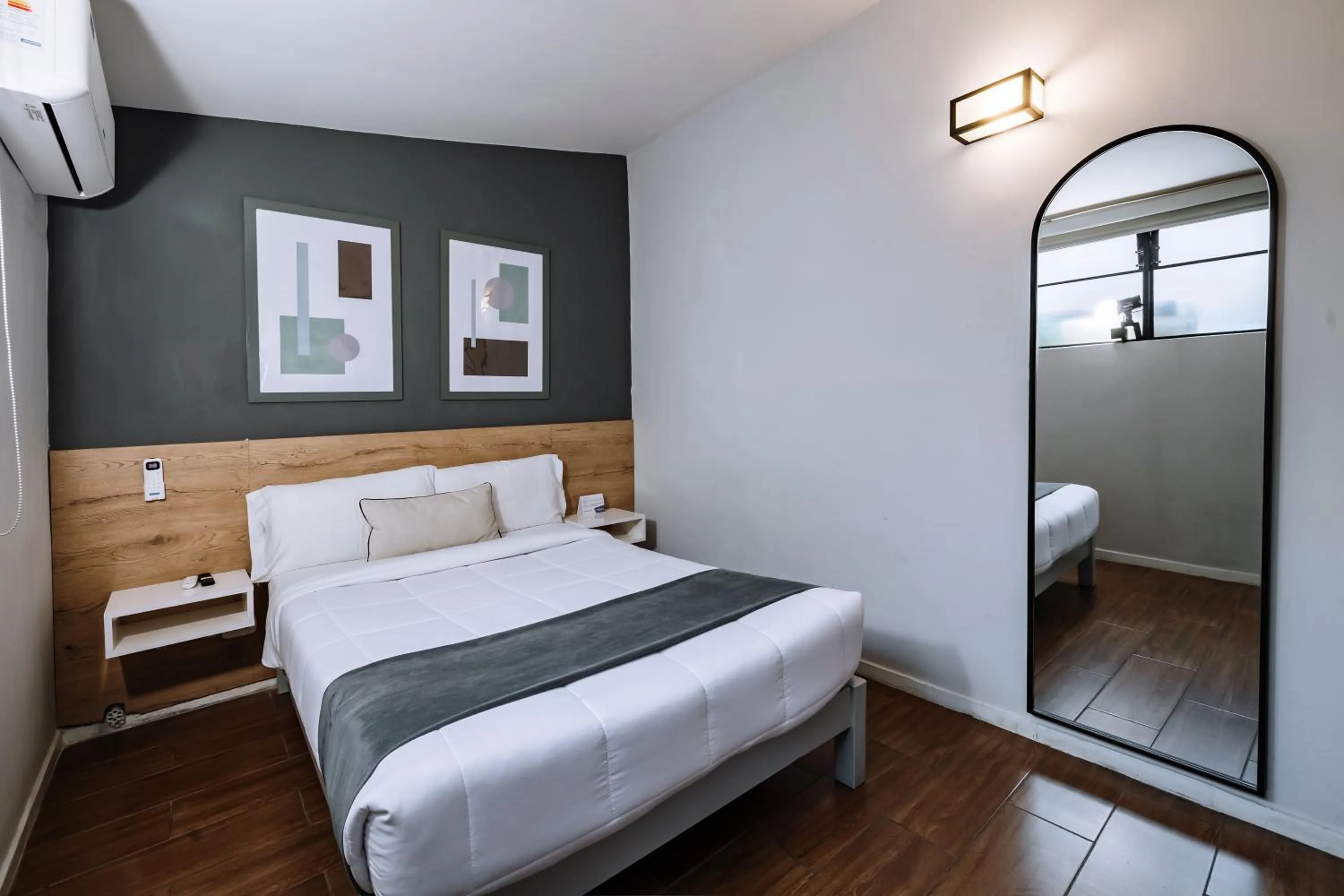 Bed in TARATA BOUTIQUE HOTEL