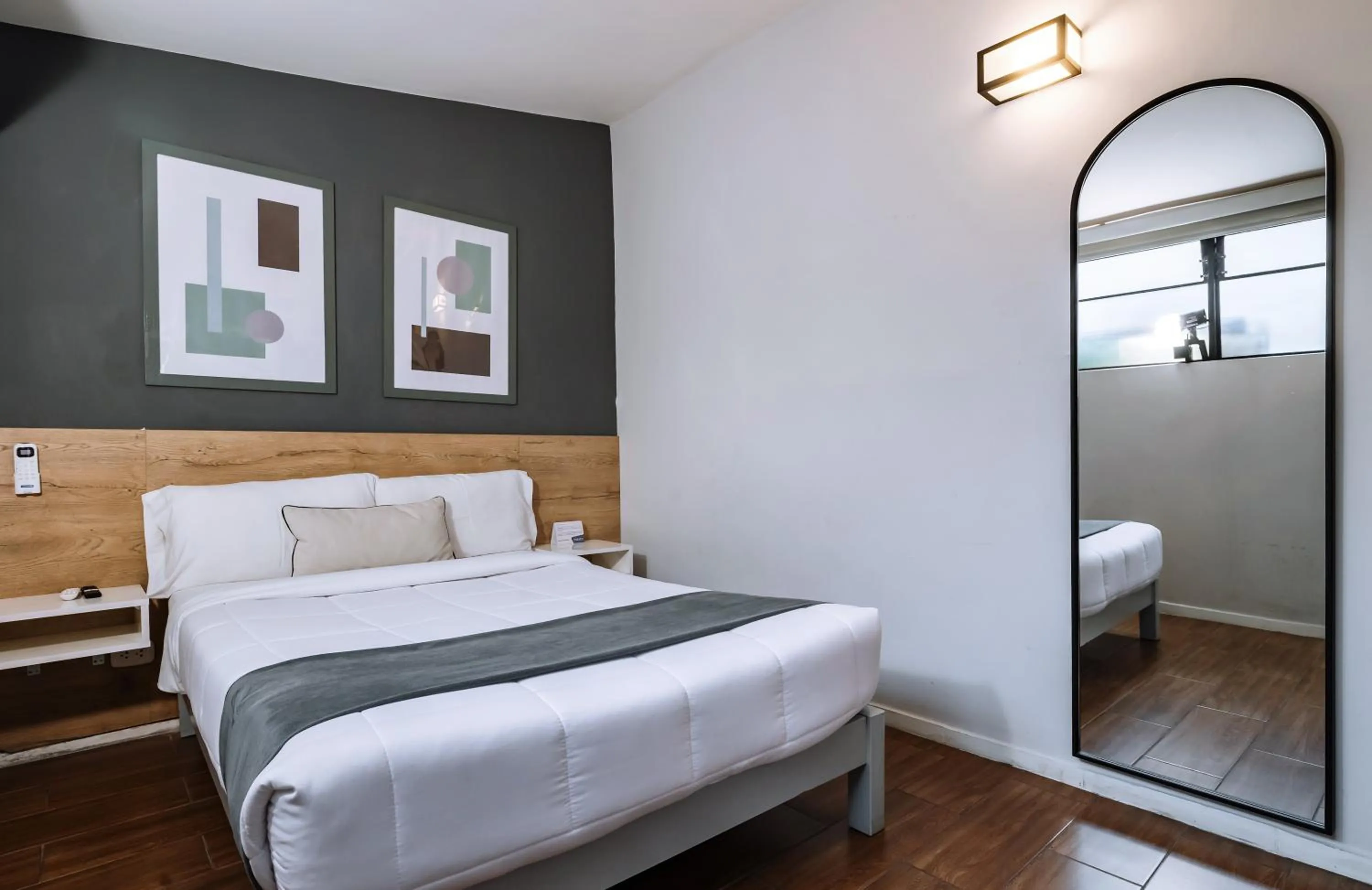 Bed in TARATA BOUTIQUE HOTEL