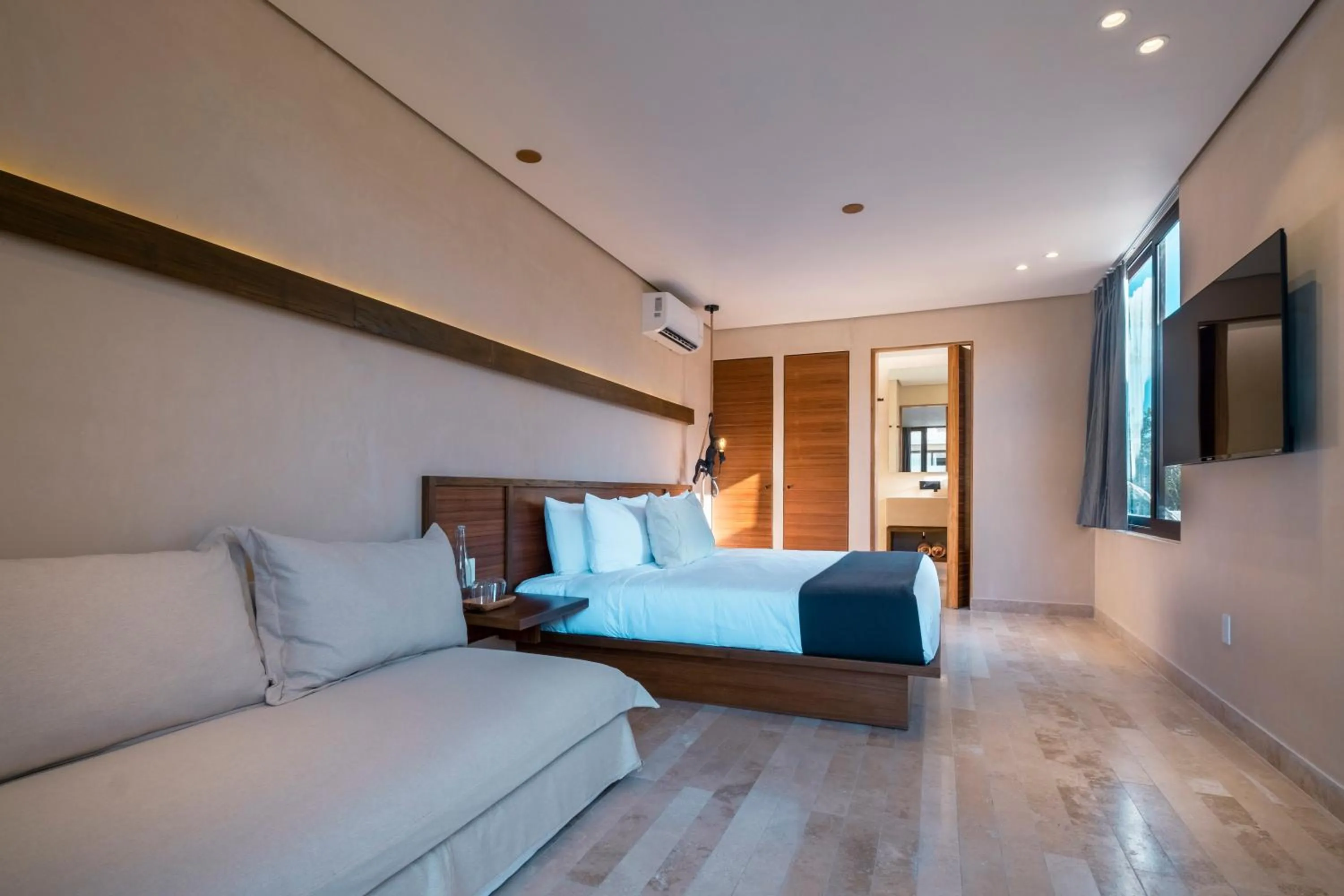 Communal lounge/ TV room, Bed in Collection O Faisano Boutique Luxury Hotel, Tulum Beach