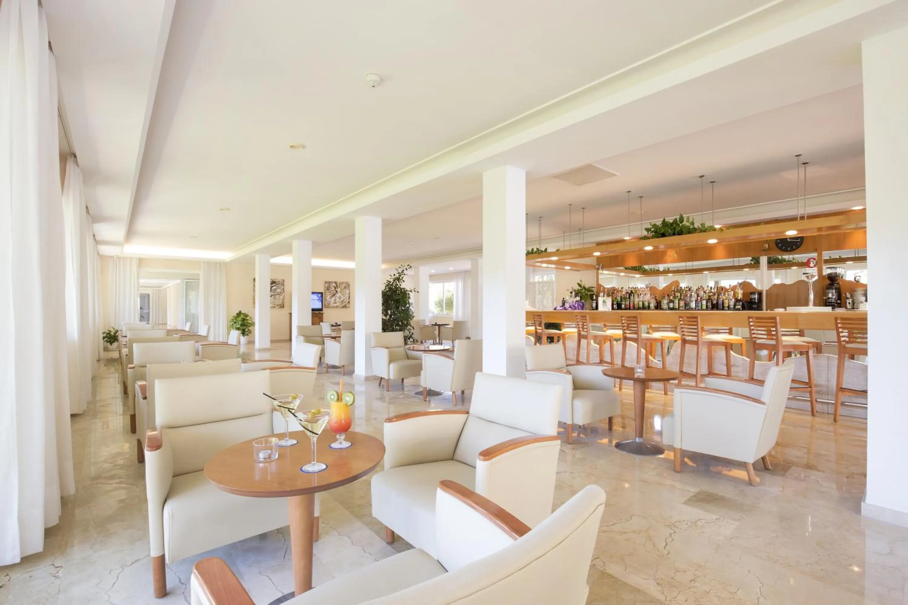 Communal lounge/ TV room in Canyamel Sun Suites Hotel