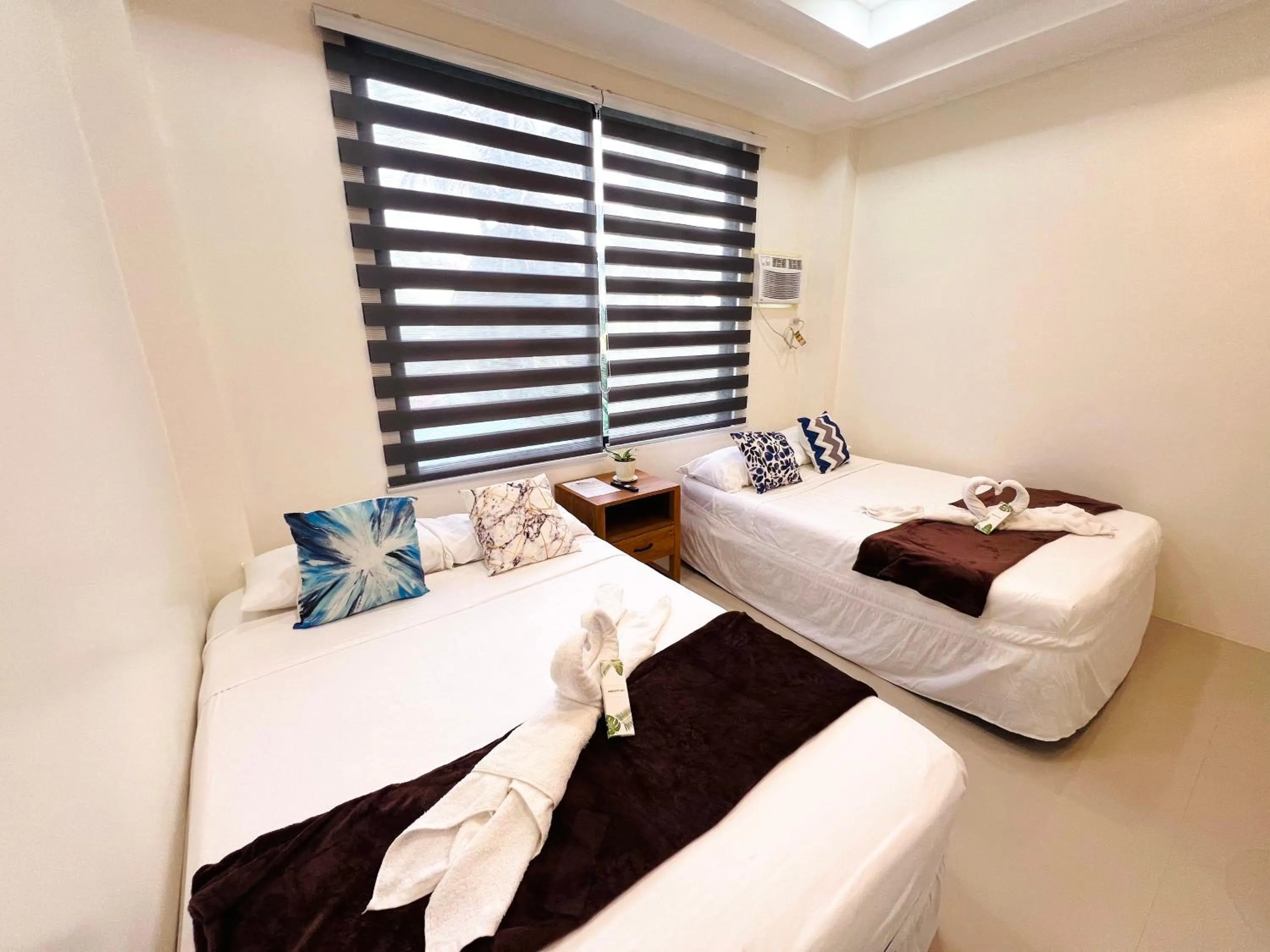 Bed in Taylors Plantacion Resort- Grande Superior Room
