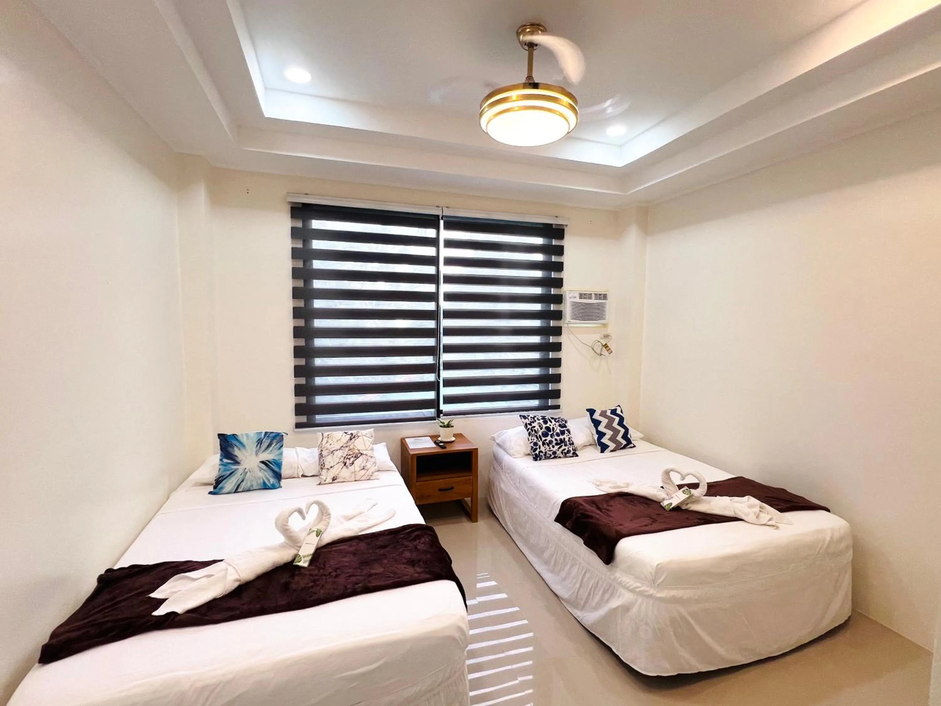 Bed in Taylors Plantacion Resort- Grande Superior Room
