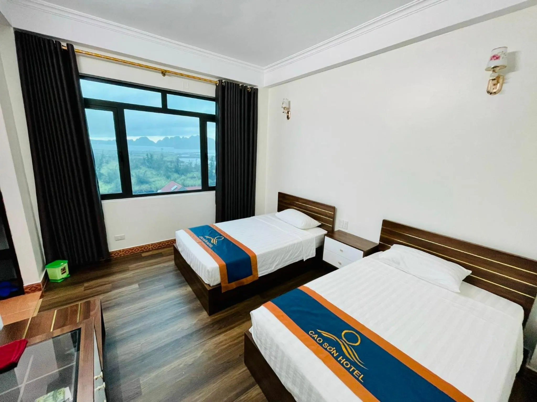 Bed in Khách Sạn Cao Sơn Cẩm Phả