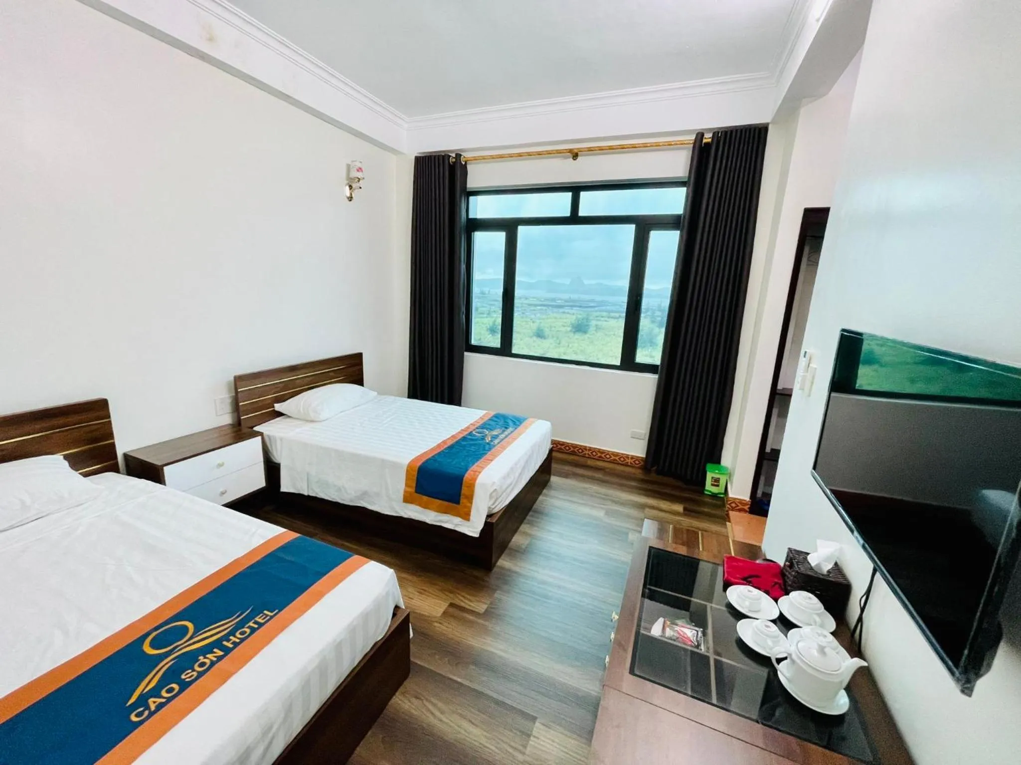 Bed in Khách Sạn Cao Sơn Cẩm Phả