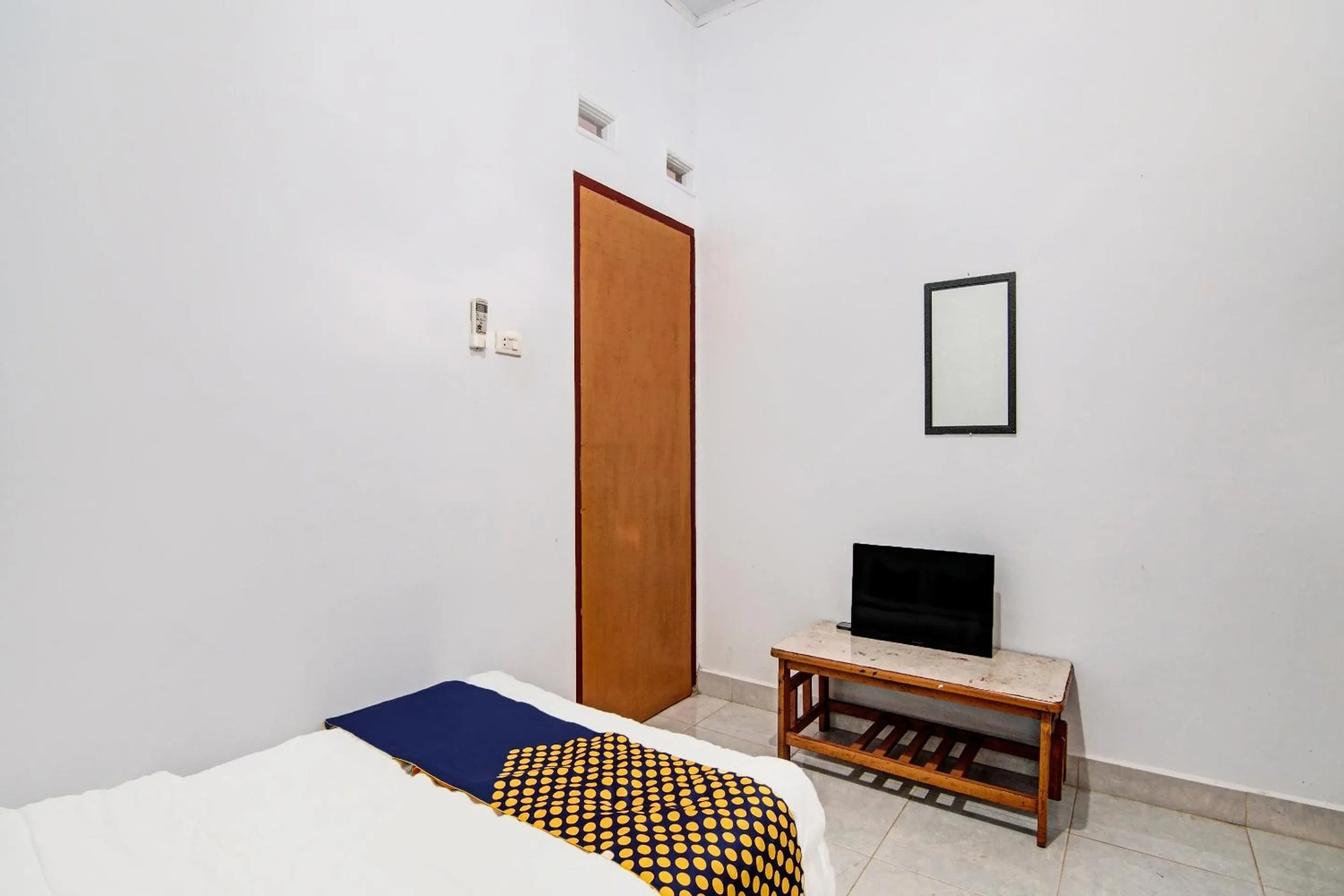 Bedroom in SPOT ON 91950 Guest House TekNong Syariah