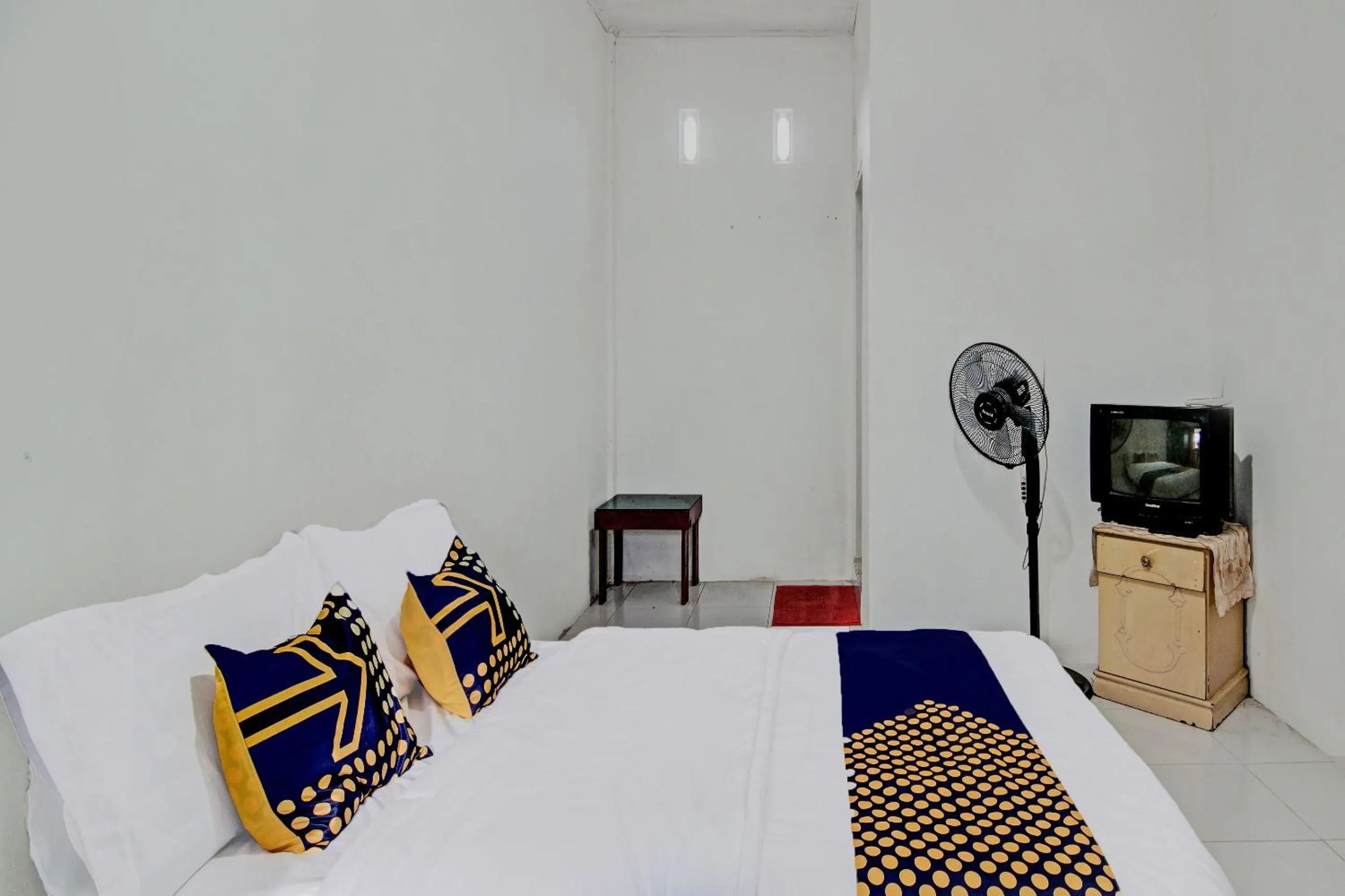 Bedroom in SPOT ON 91950 Guest House TekNong Syariah