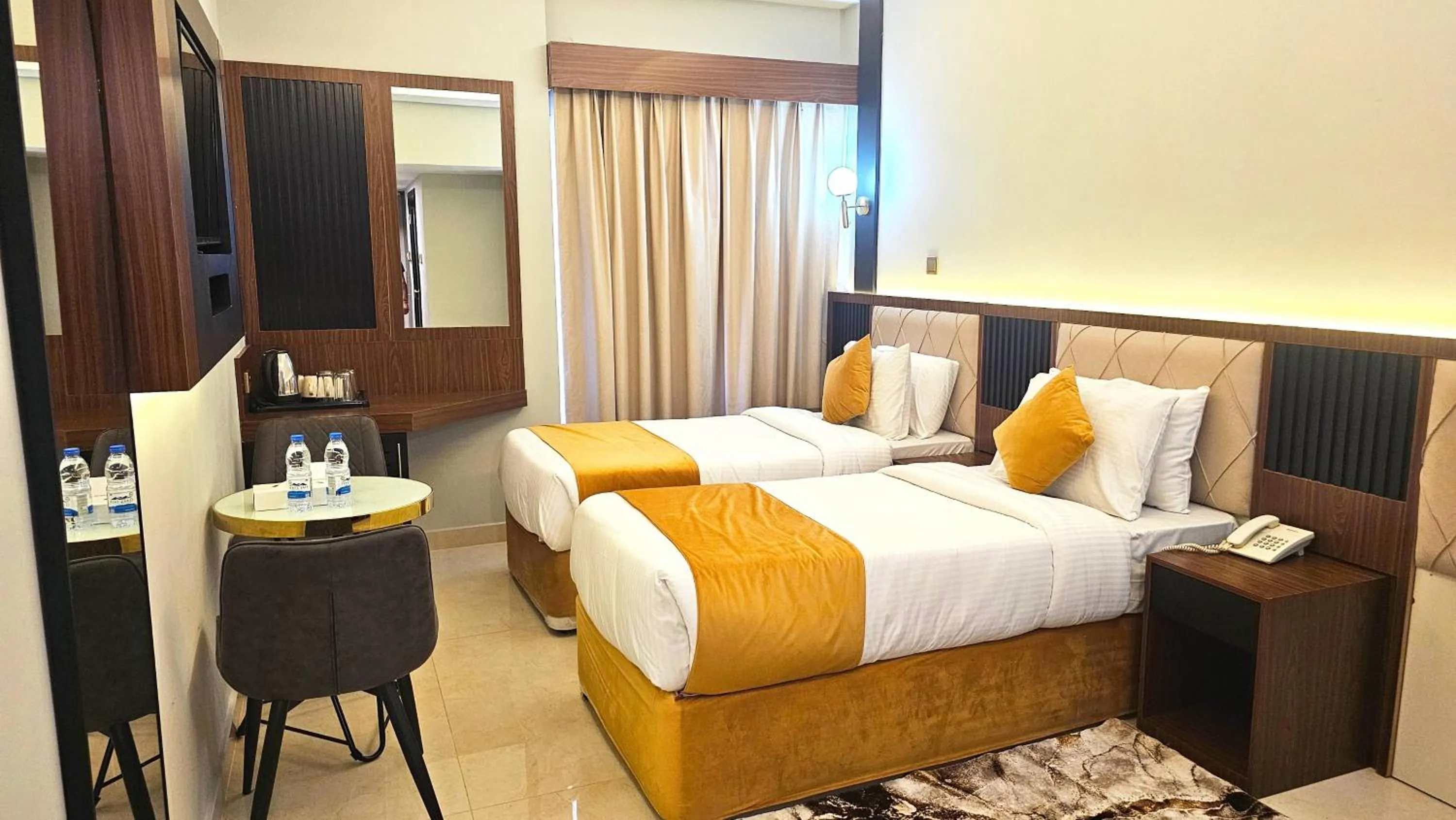 Bed in Concorde Inn Hotel