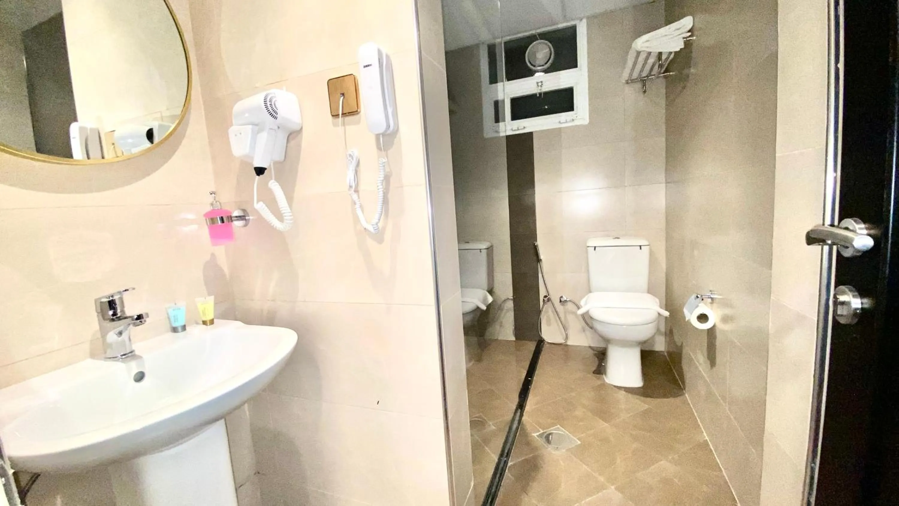 Bathroom in Concorde Inn Hotel