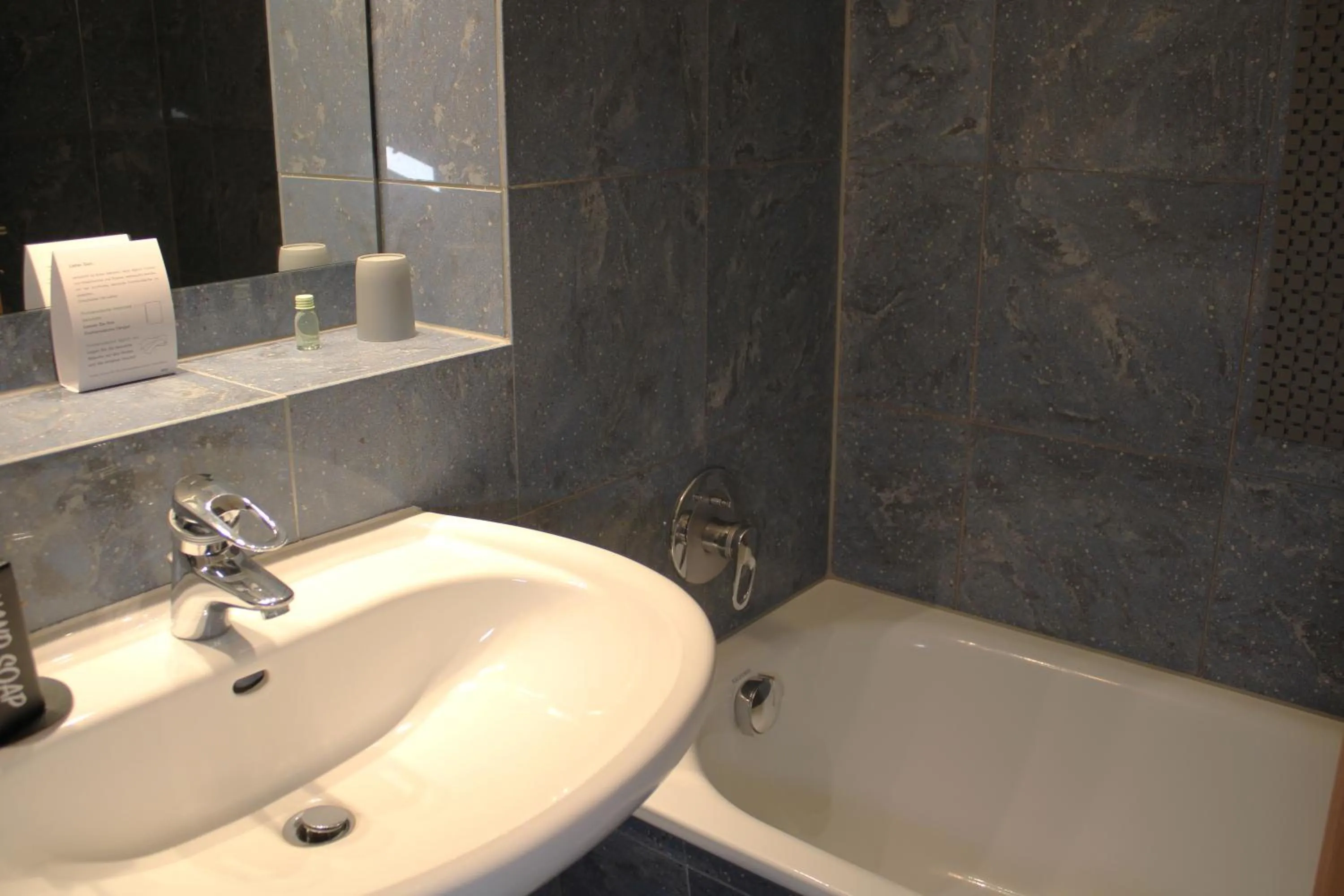 Bathroom in Hotel Adler & Eventlocation GmbH