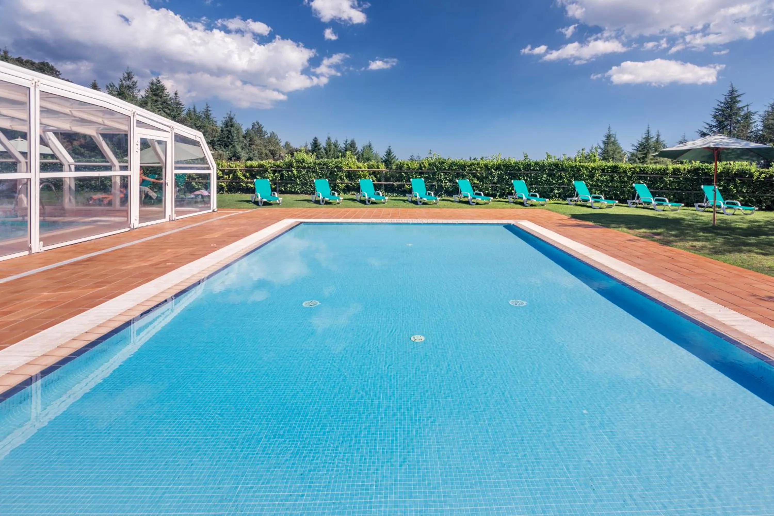 Swimming pool in Vilar Rural De Sant Hilari Sacalm by Serhs Hotels