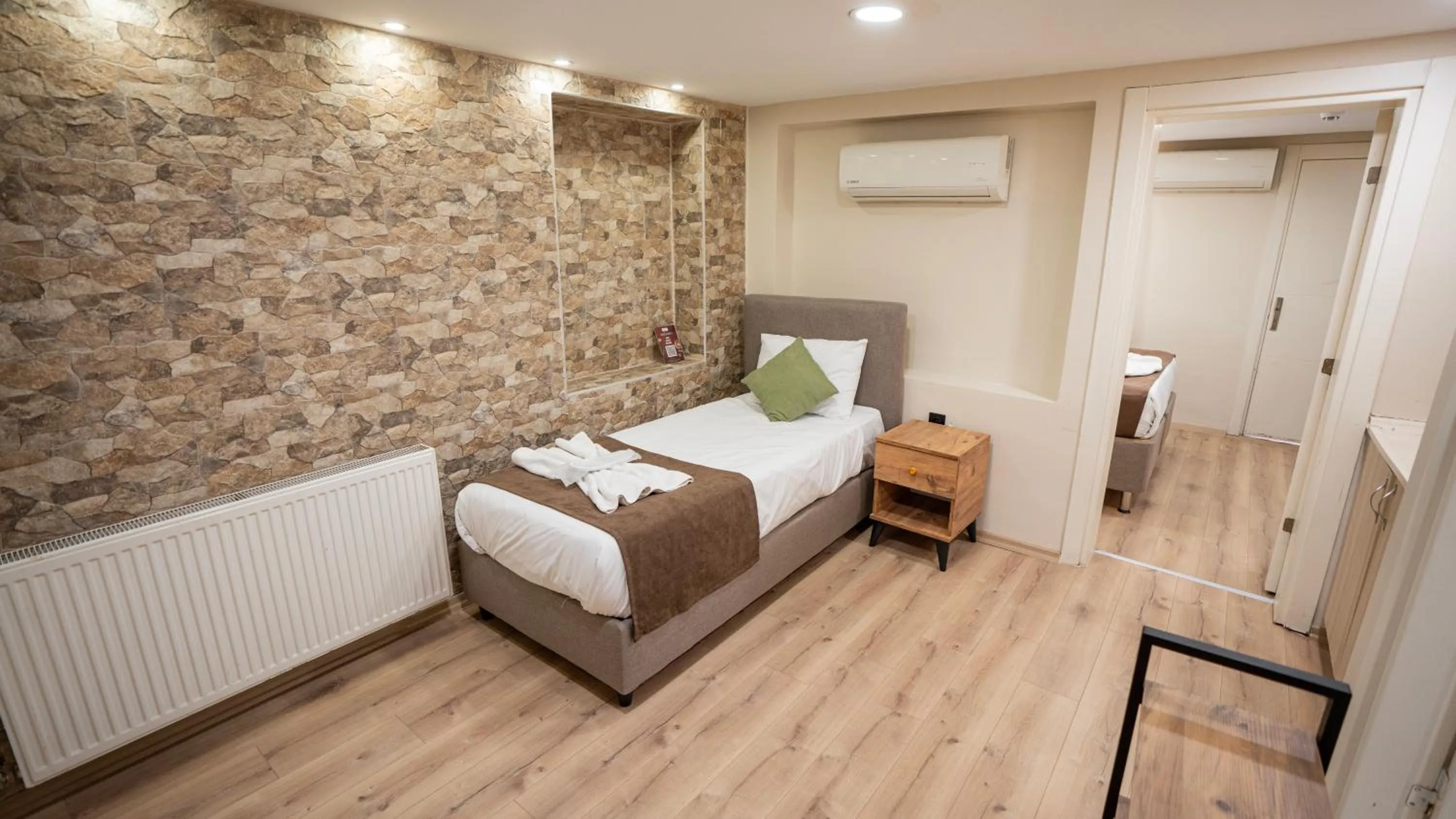 Bed in MİLA SUİTES TAKSİM