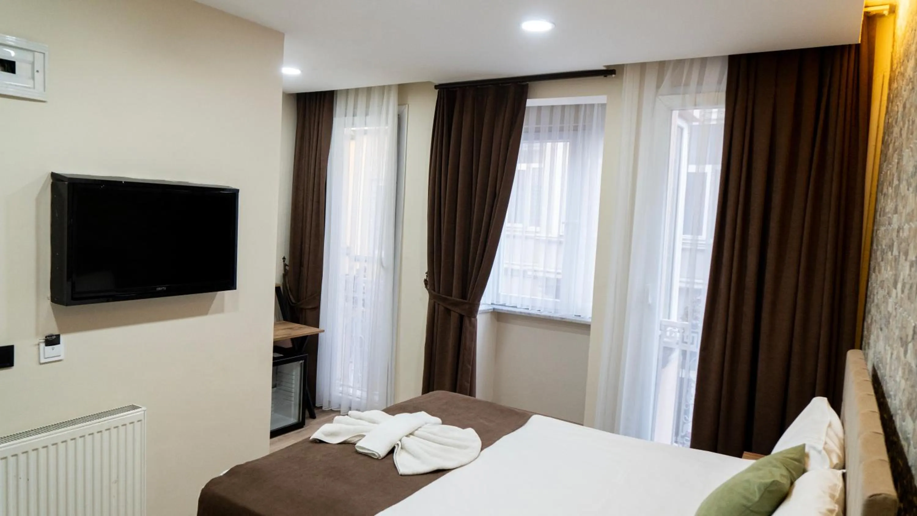 Bed in MİLA SUİTES TAKSİM