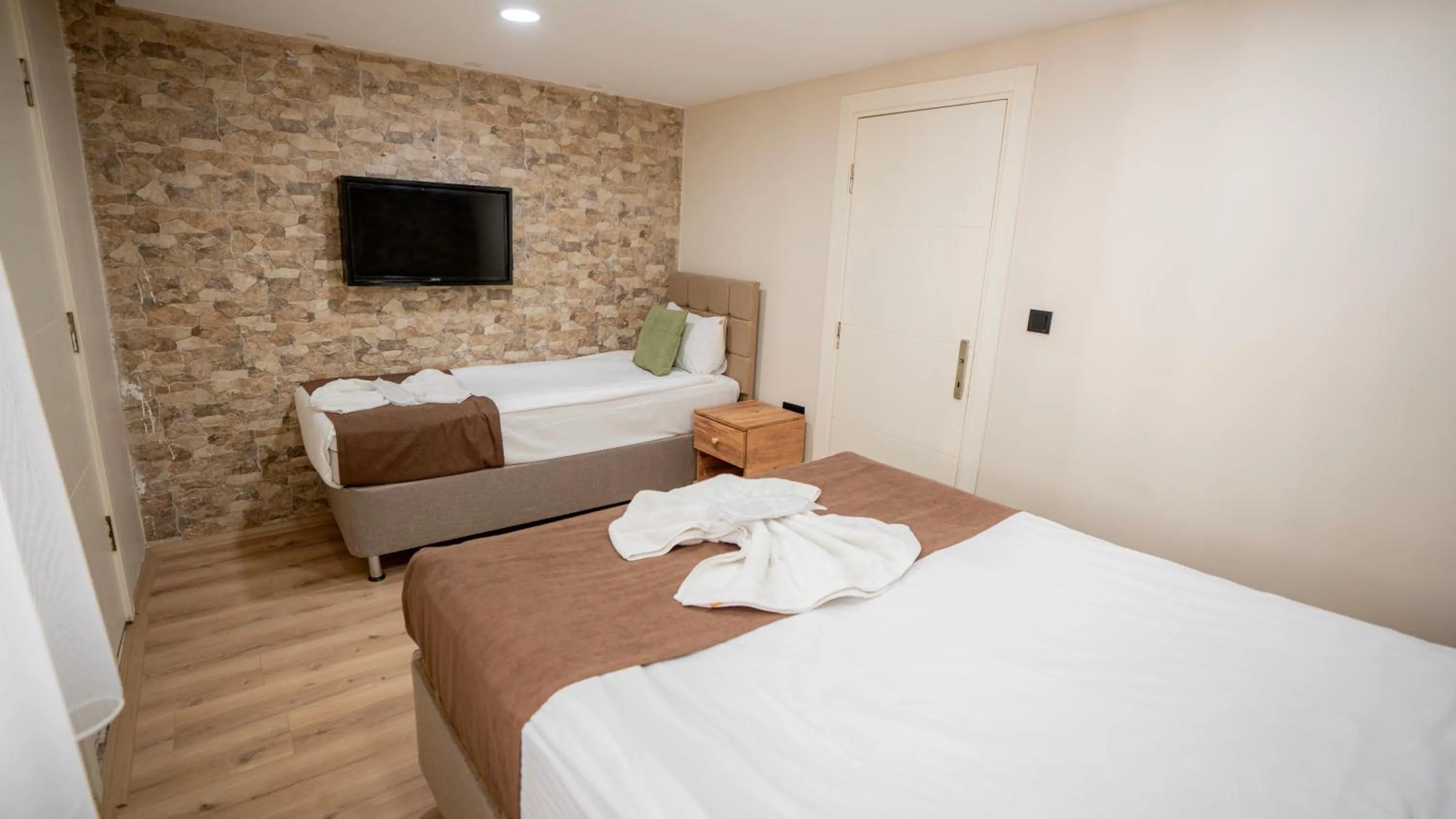 Bed in MİLA SUİTES TAKSİM