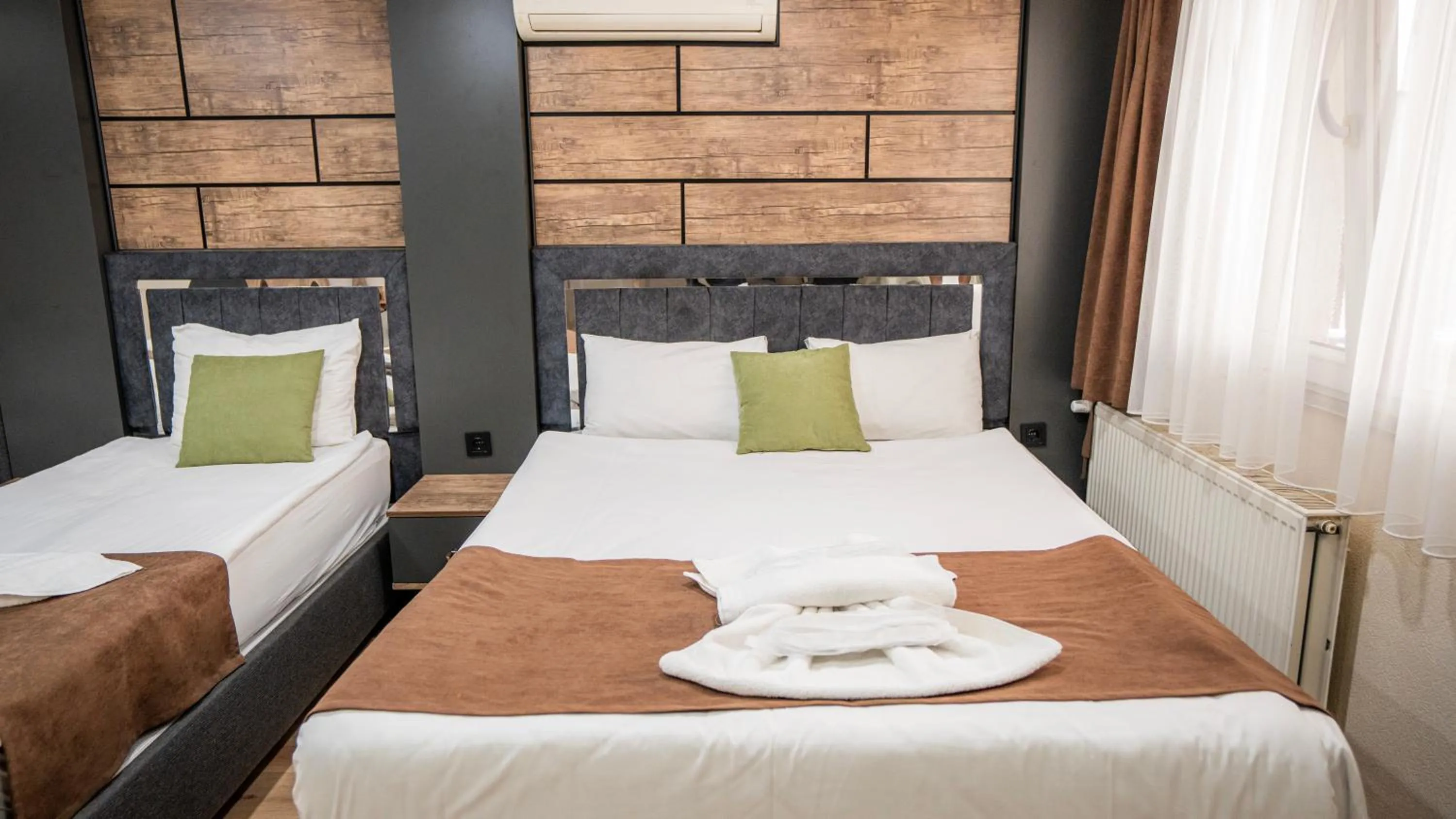 Bed in MİLA SUİTES TAKSİM