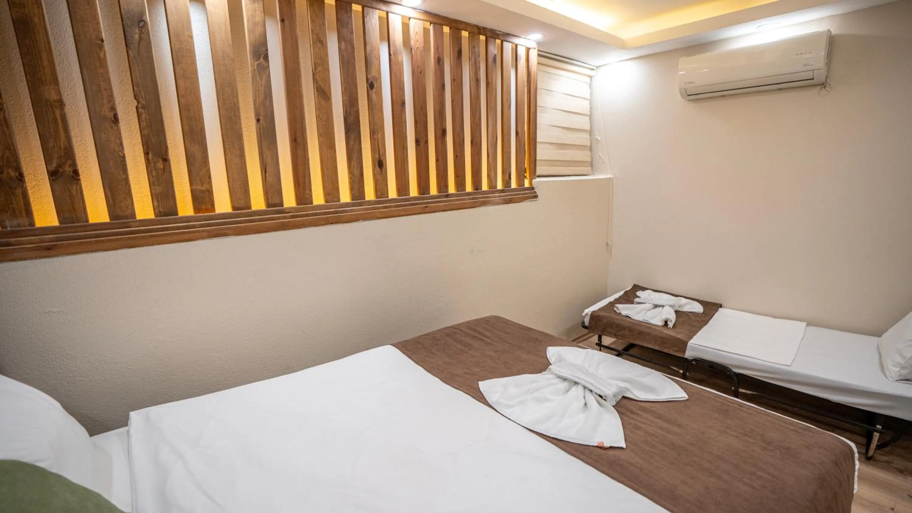 Bed in MİLA SUİTES TAKSİM