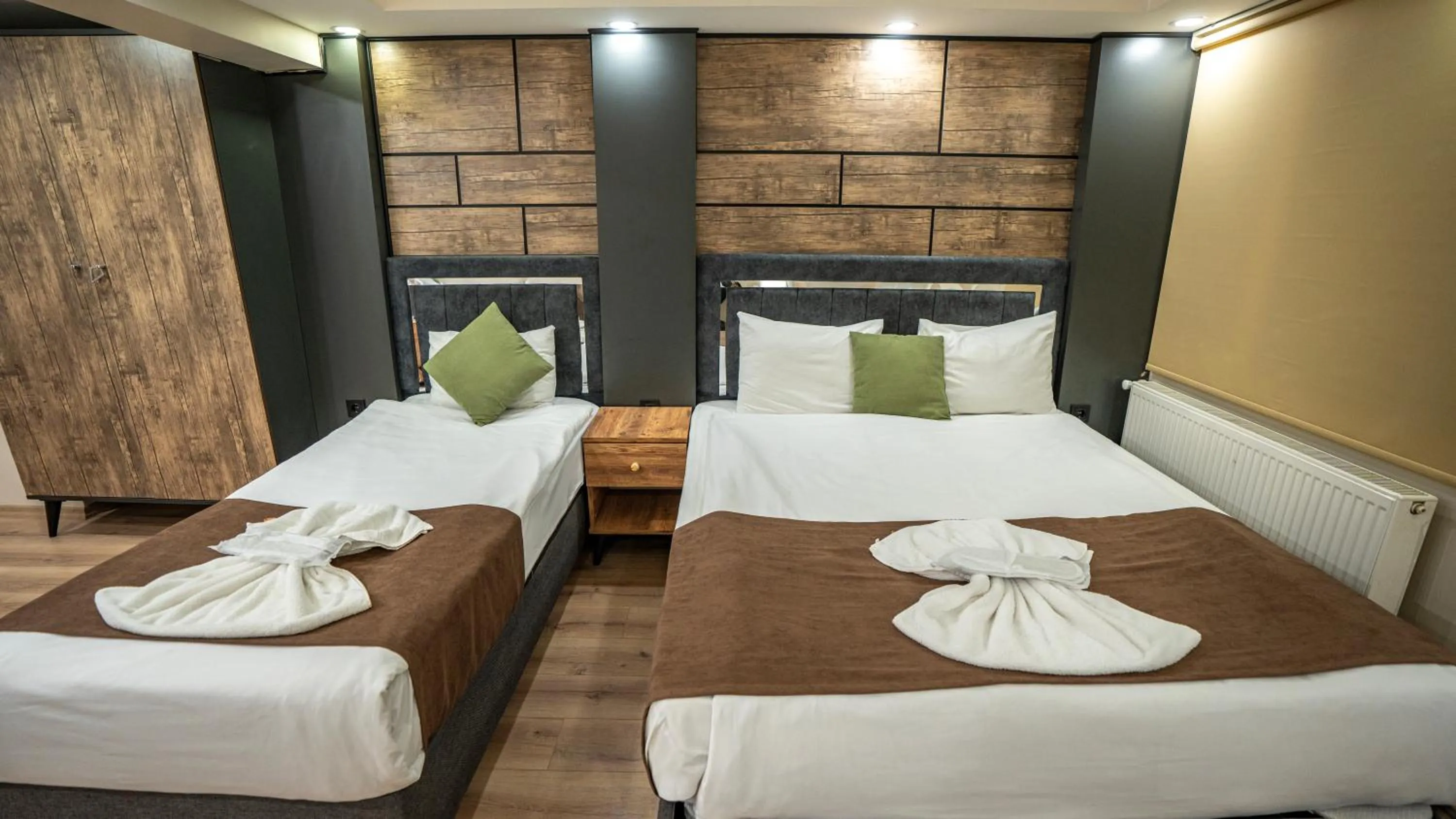 Bed in MİLA SUİTES TAKSİM