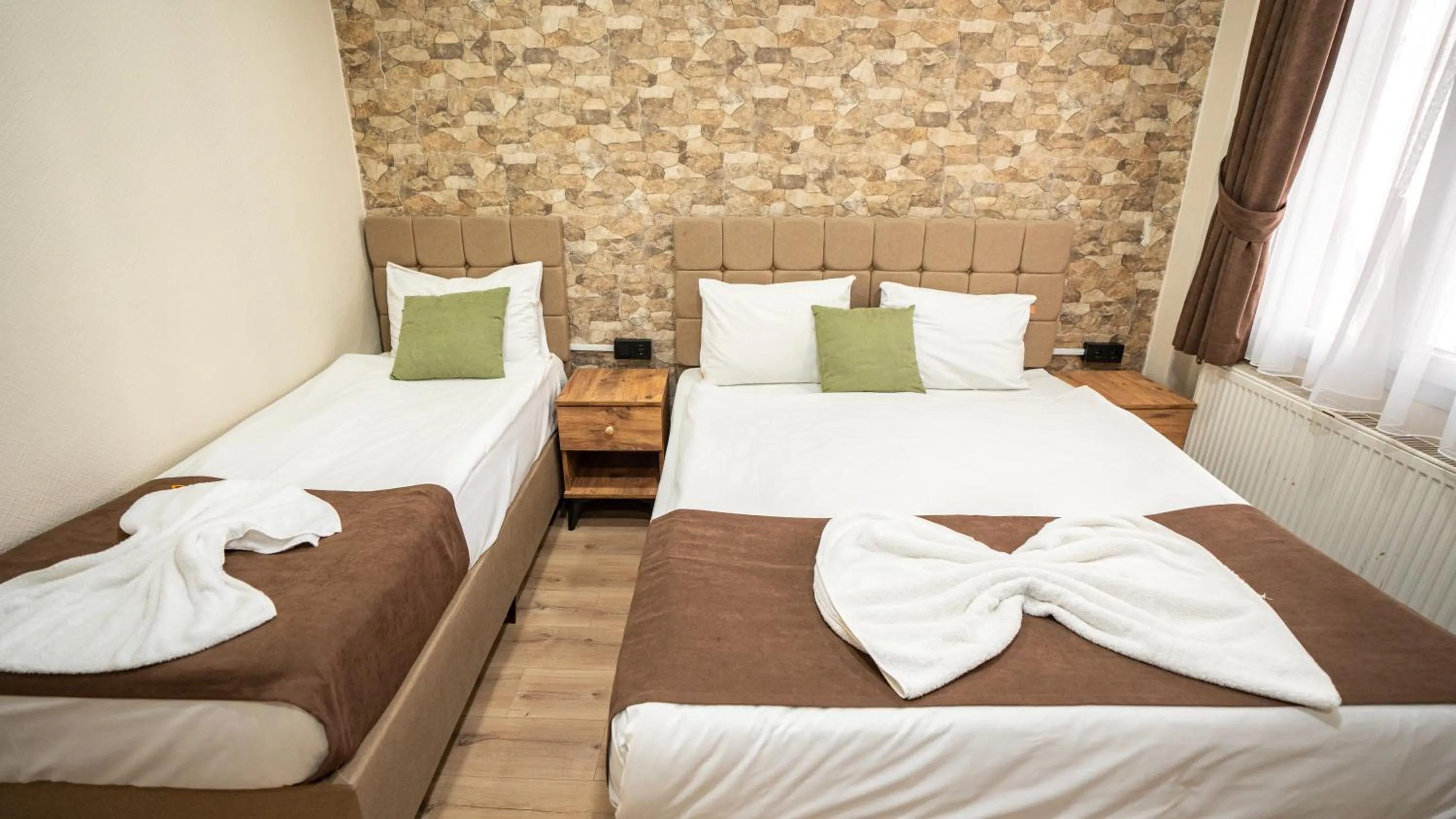 Bed in MİLA SUİTES TAKSİM