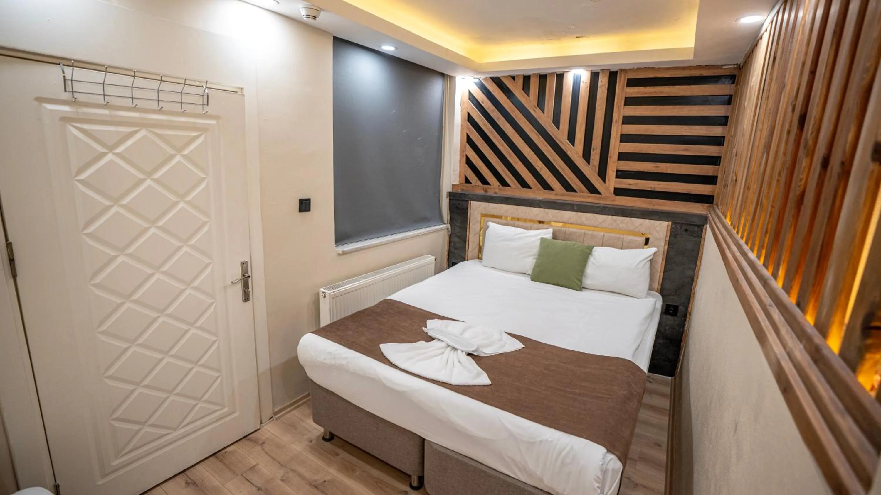 Bed in MİLA SUİTES TAKSİM