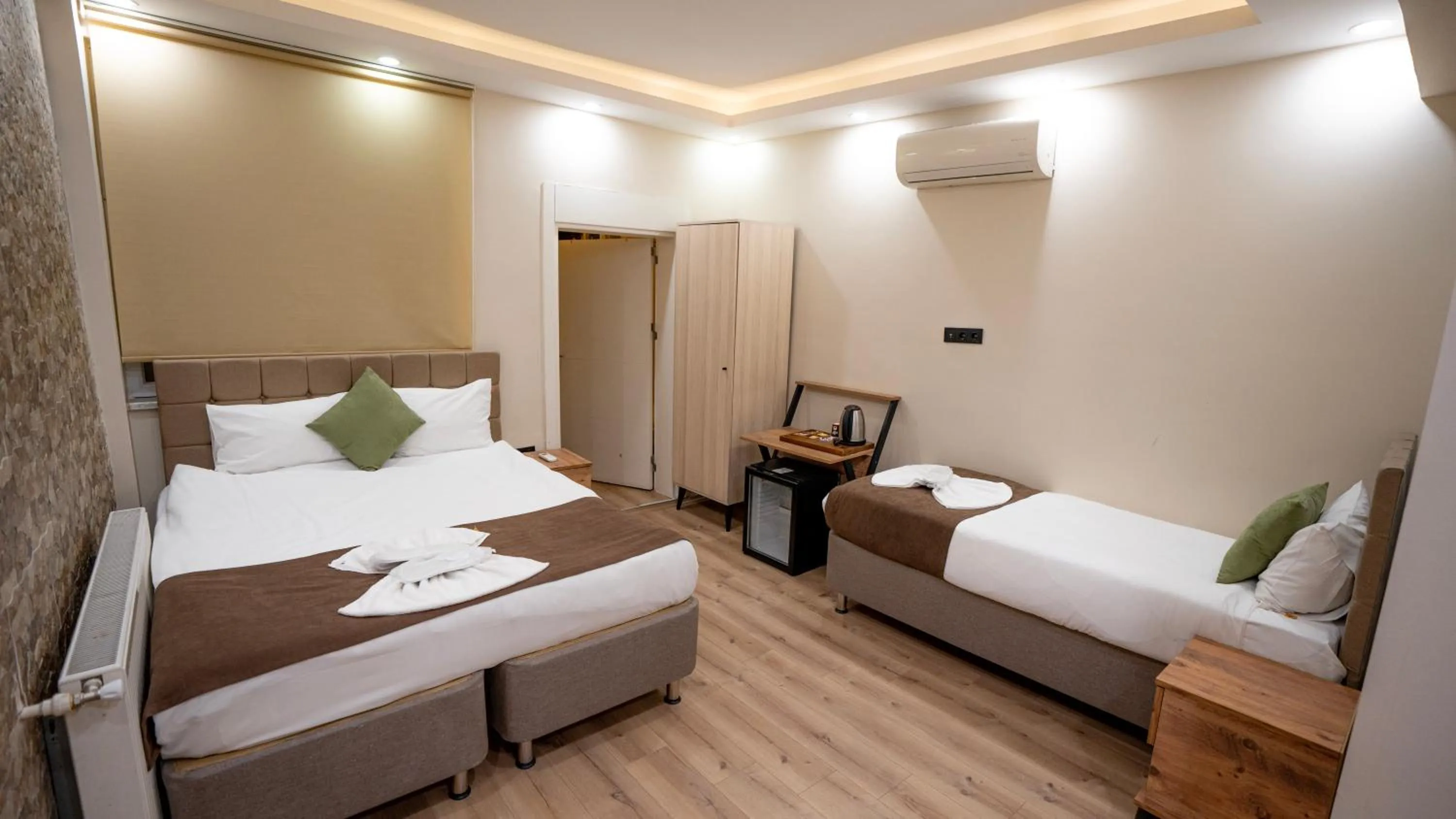 Bed in MİLA SUİTES TAKSİM