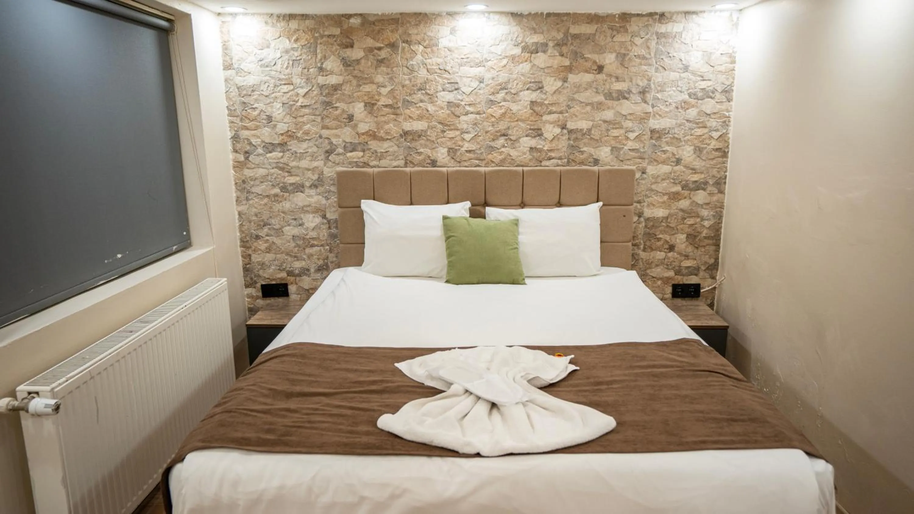 Bed in MİLA SUİTES TAKSİM