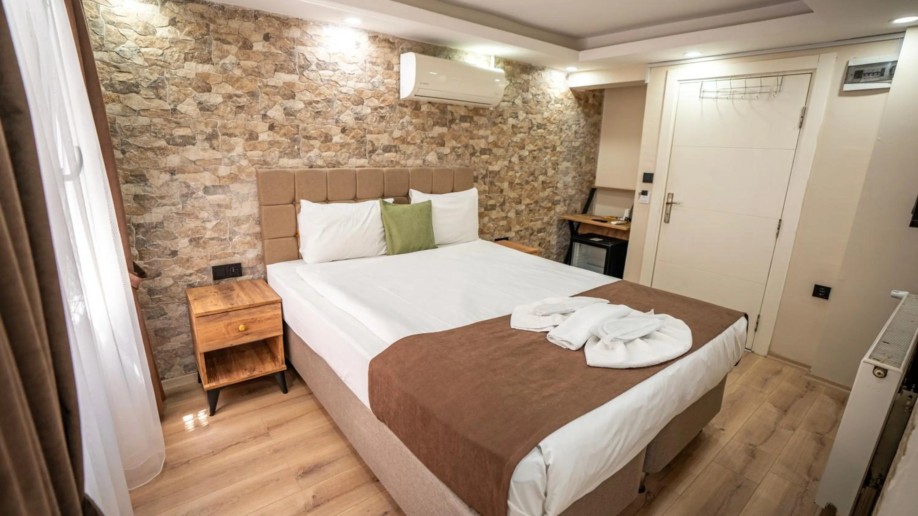 Bed in MİLA SUİTES TAKSİM