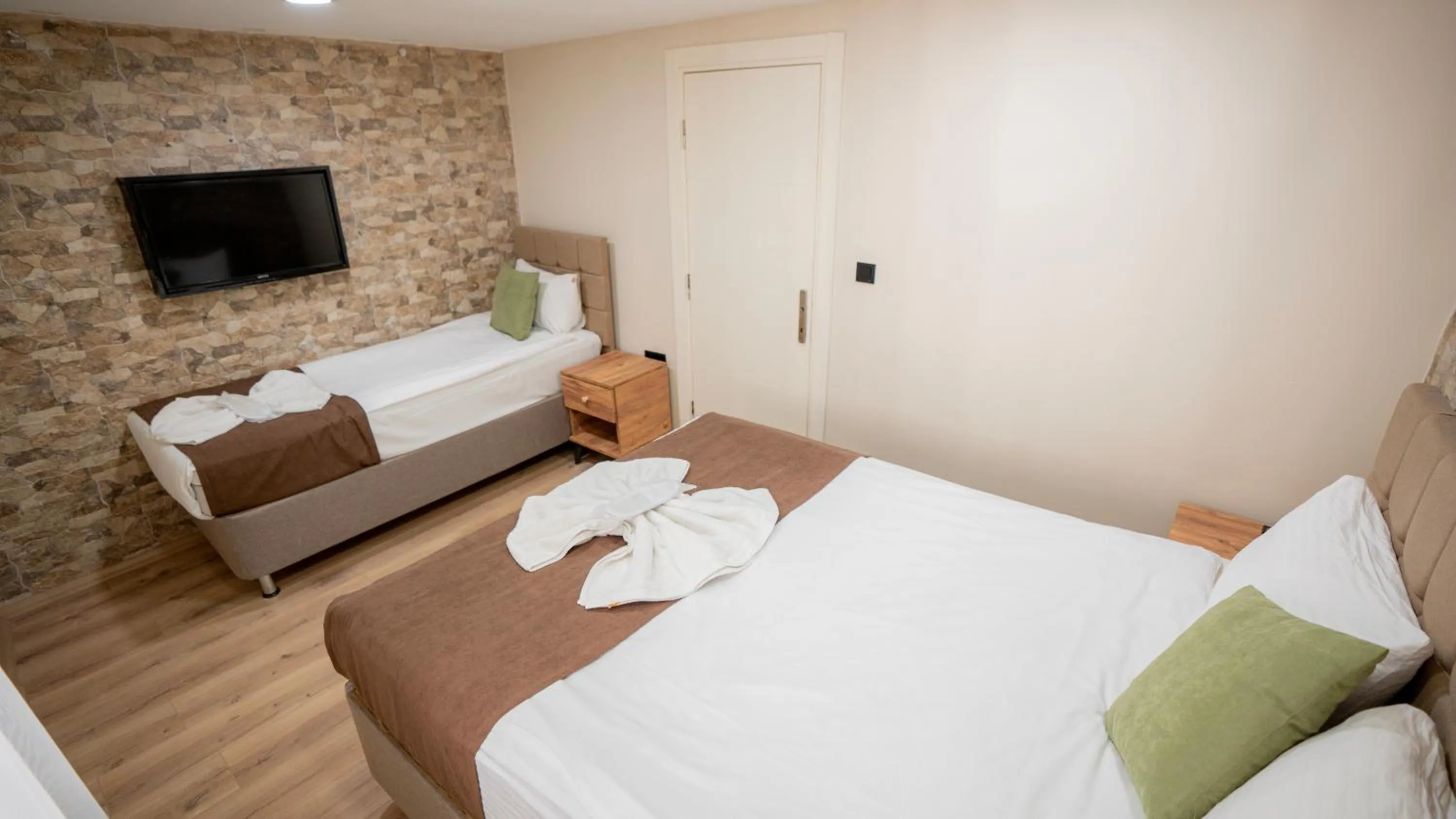 Bed in MİLA SUİTES TAKSİM