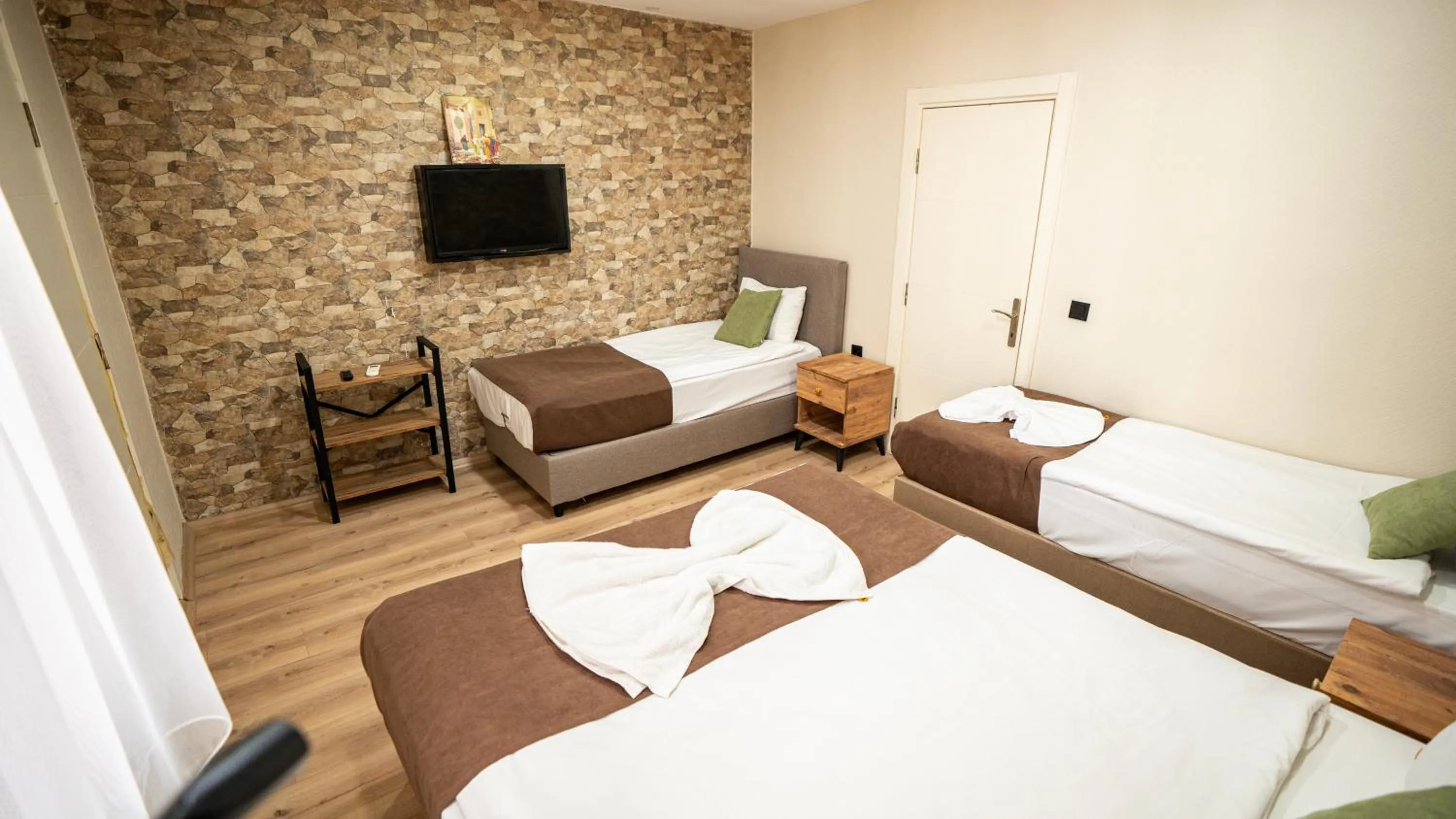 Bed in MİLA SUİTES TAKSİM