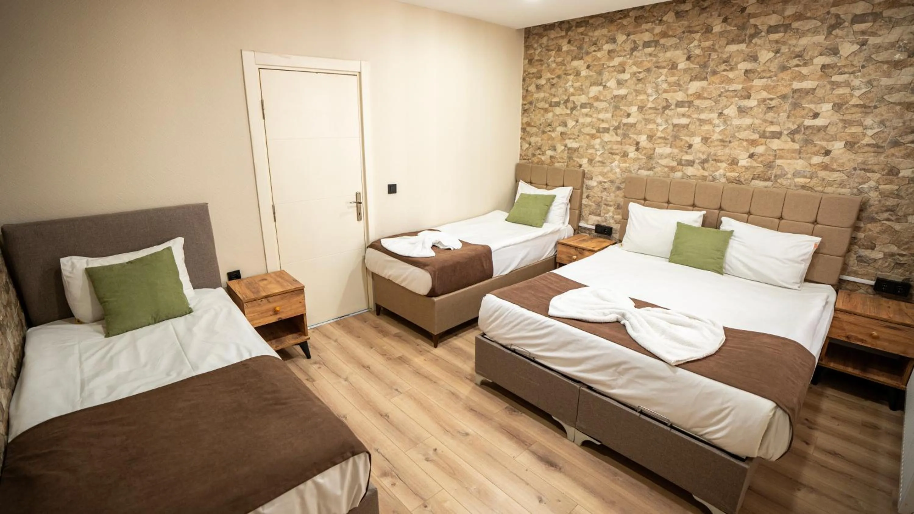 Bed in MİLA SUİTES TAKSİM