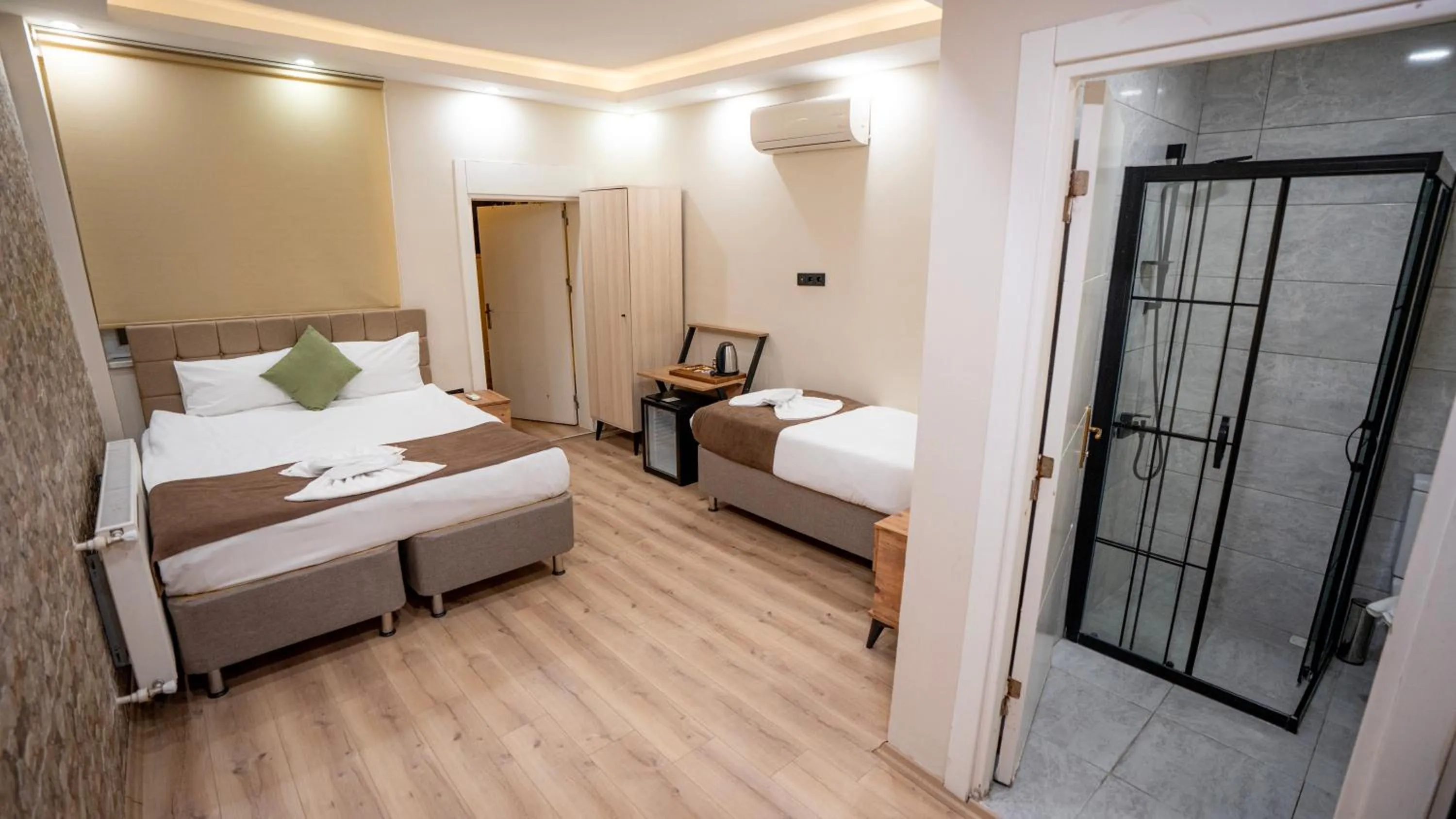 Bed in MİLA SUİTES TAKSİM