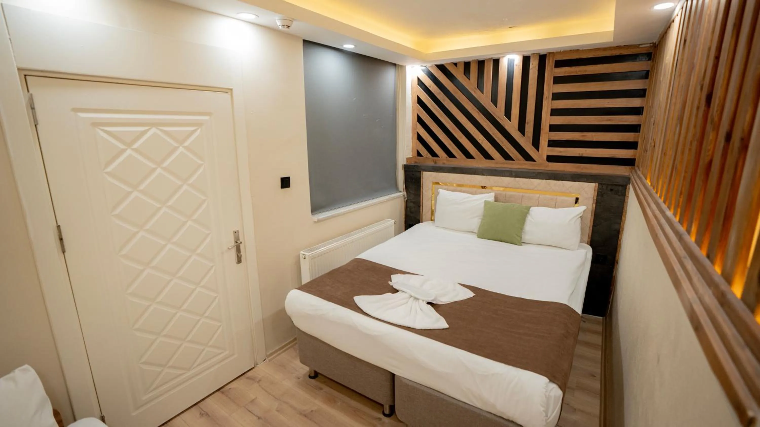 Bed in MİLA SUİTES TAKSİM