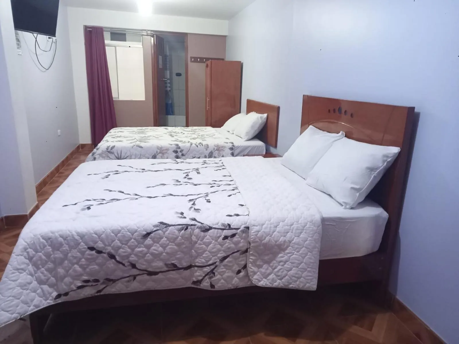 Bed in Hospedaje Feliz