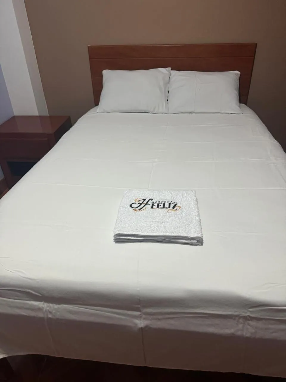 Bed in Hospedaje Feliz