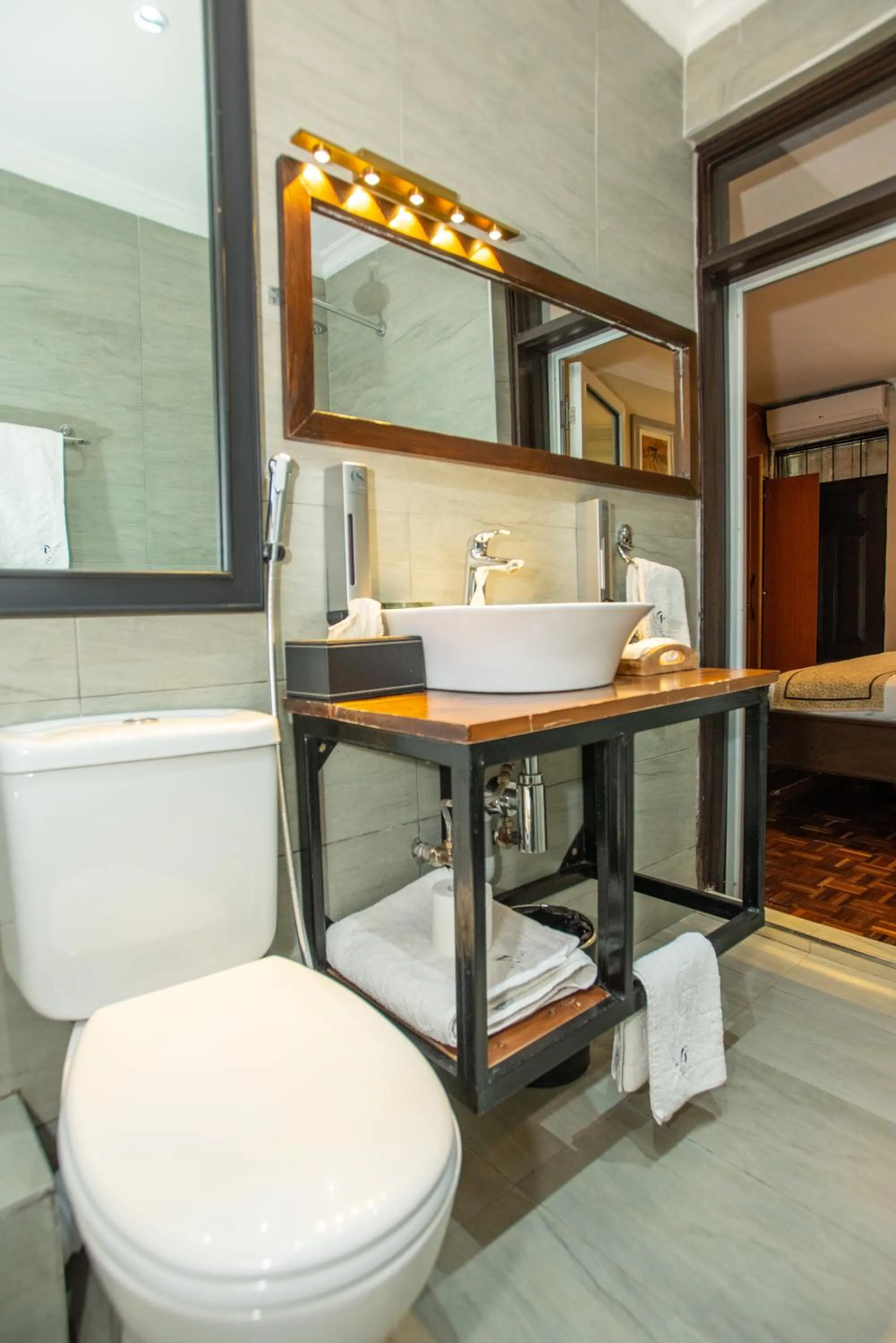 Toilet in Cozy Stead Hotel - Garden House, Gigiri