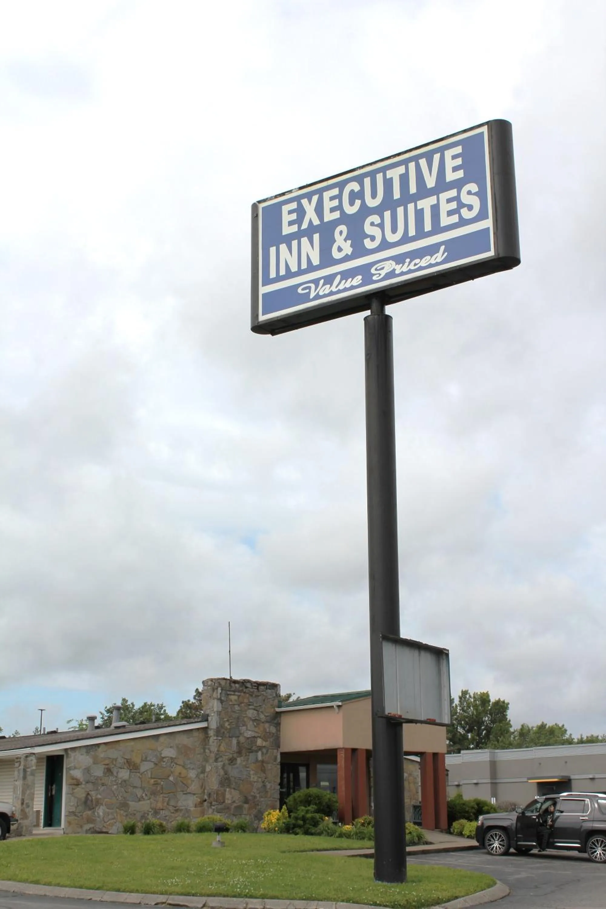 Property logo or sign in Executive Inn & Suites