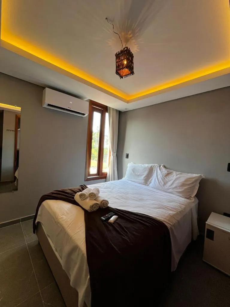 Bed in Milos Hotel Icaraizinho