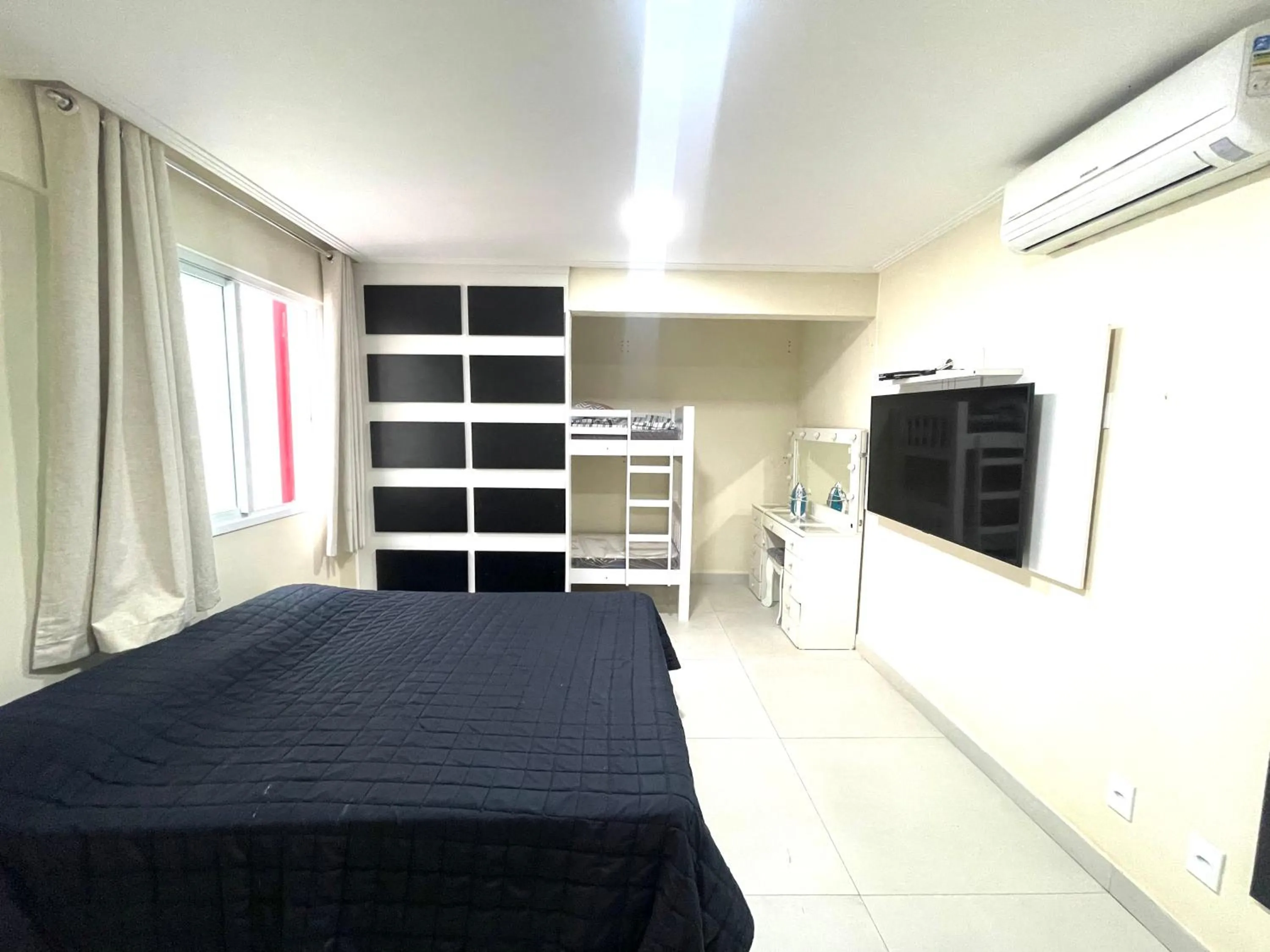 Bedroom, Bed in Eu Amo Arraial Hospedagem - Cobertura com Jacuzzi Praia Grande