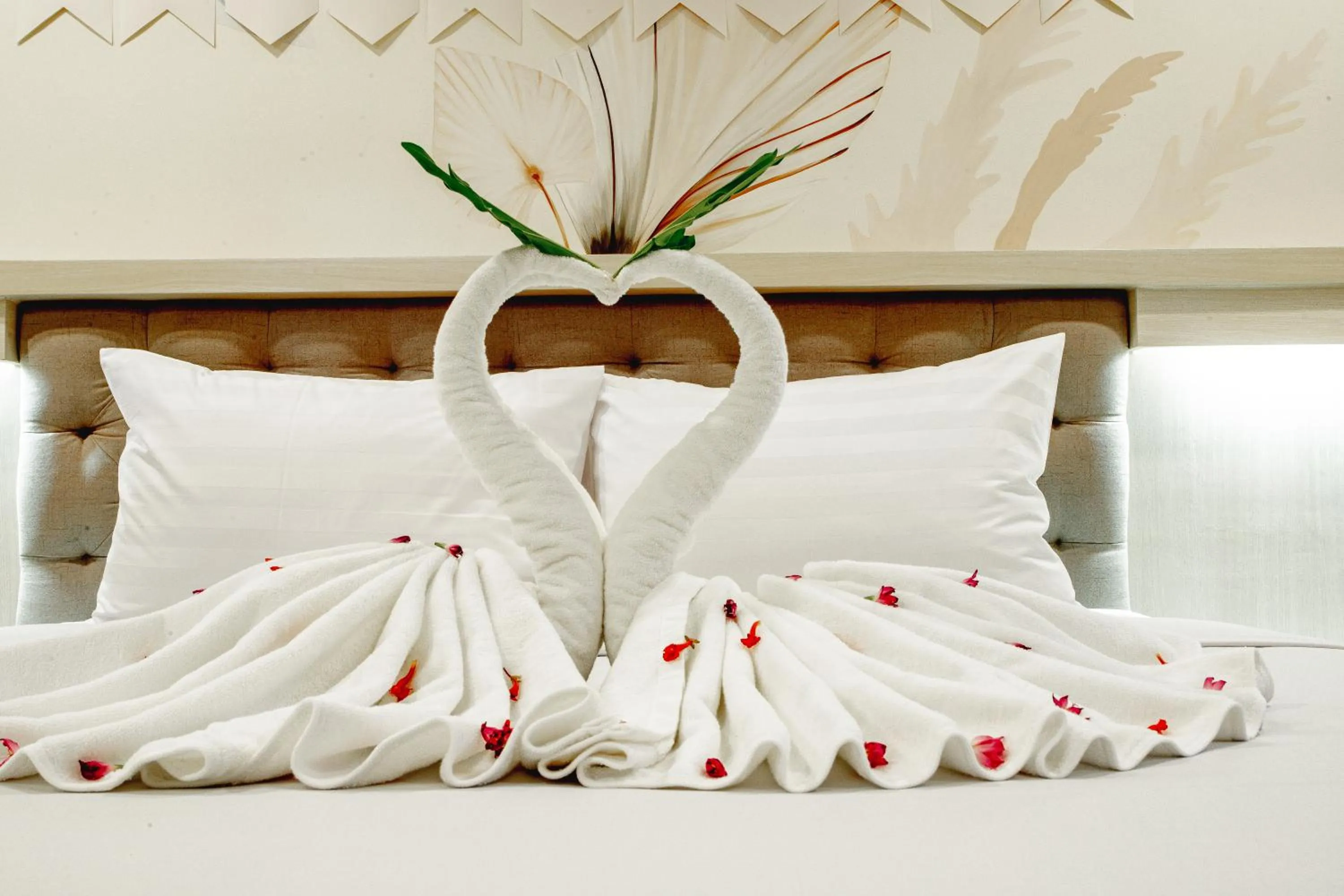 towels, Bed in Ora Beach Resort