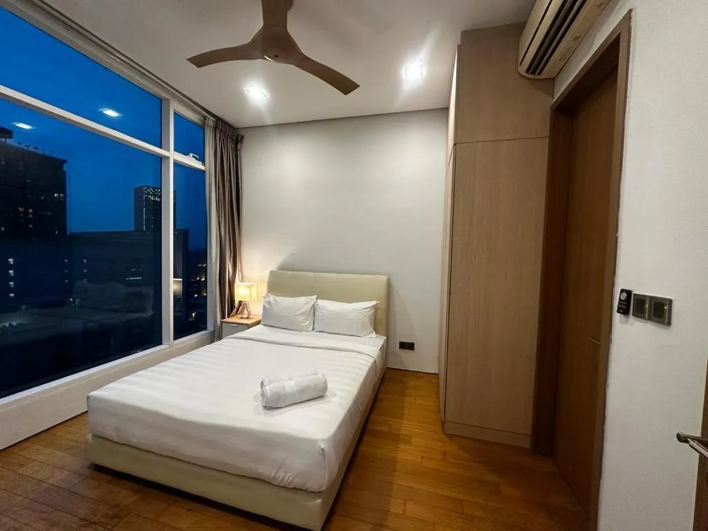 Bed in Vortex Suites KLCC by NADIA