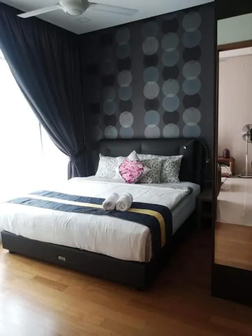 Bed in Vortex Suites KLCC by NADIA