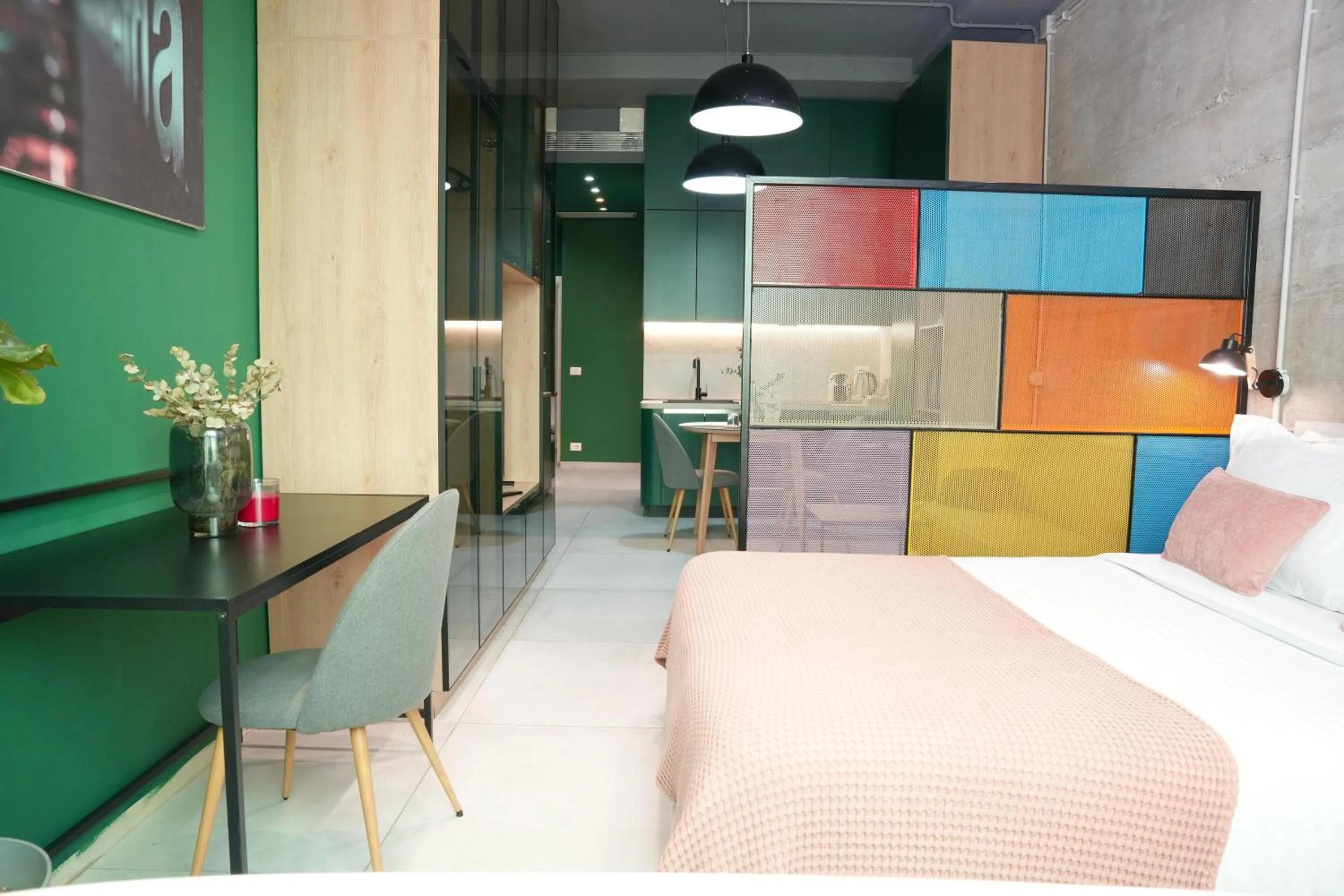 Bed in Ambassador Skyline Apartments