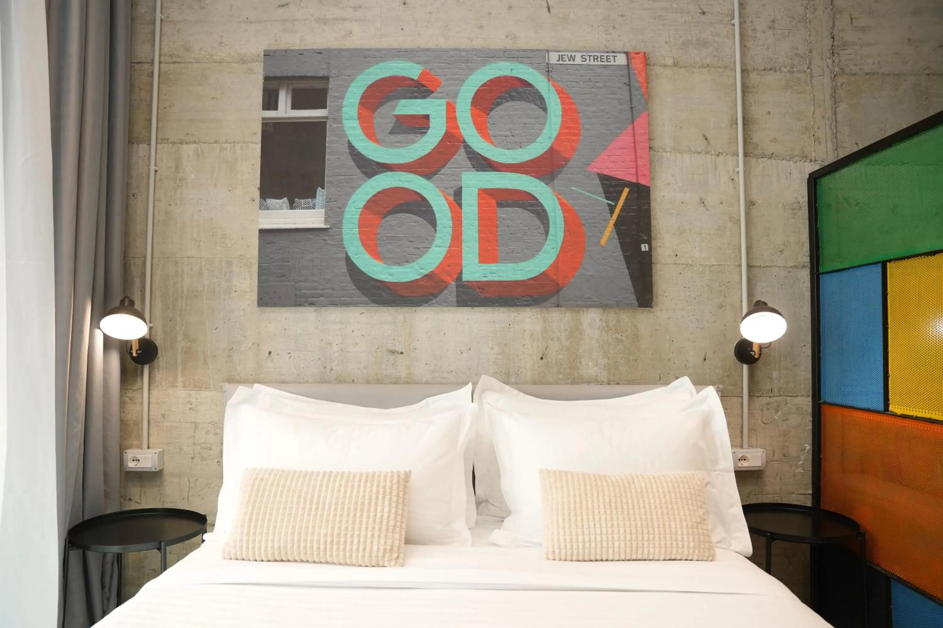 Bed in Ambassador Skyline Apartments