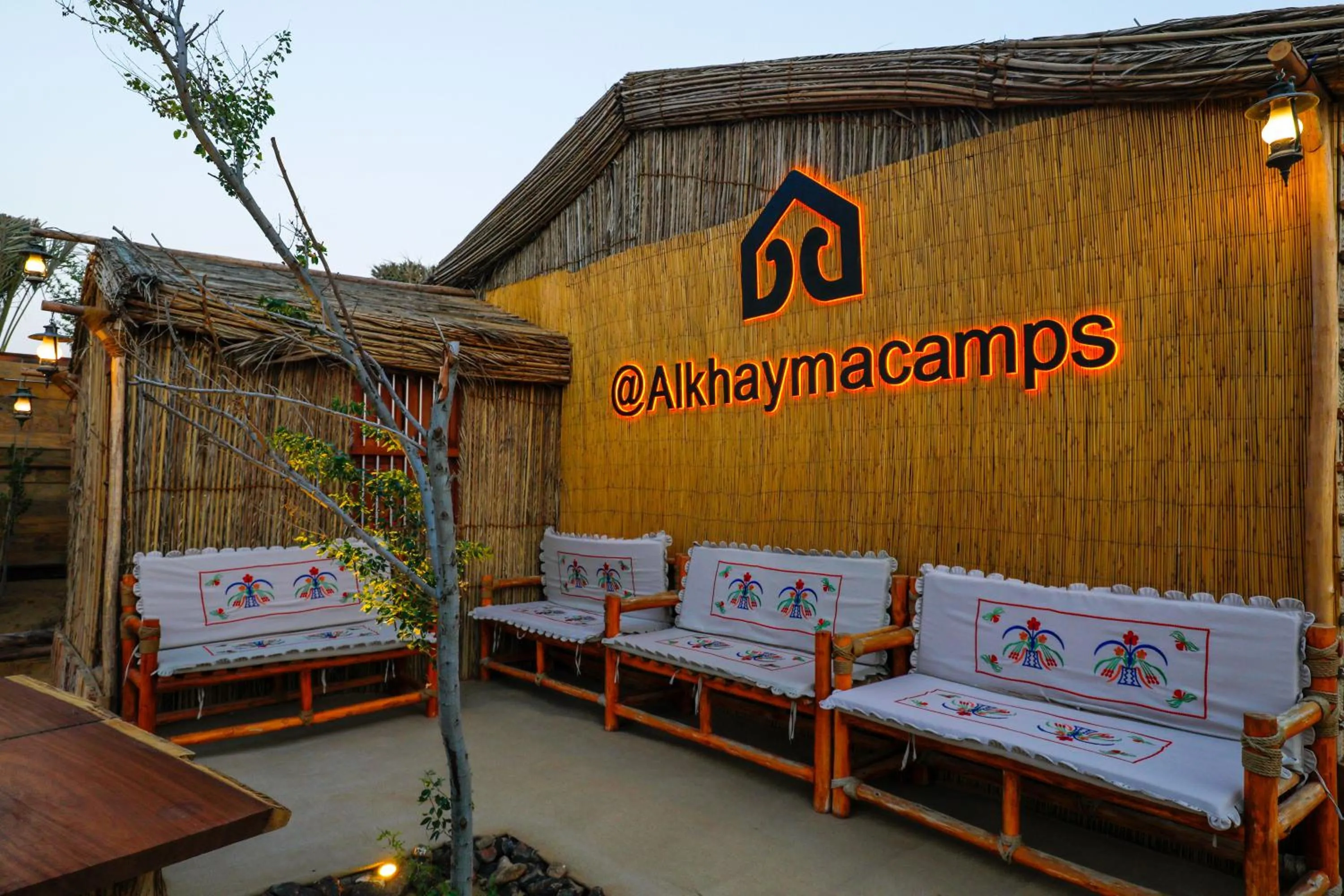 Property logo or sign in Al Khayma Camp "Elite Glamping & Dining in Experience"