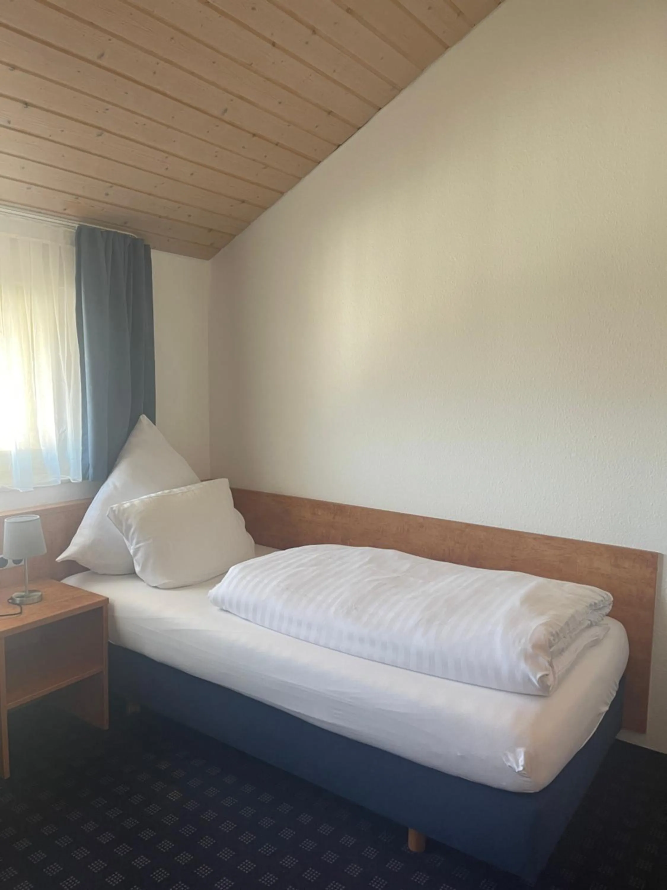 Bed in KRYSTALL Hotel