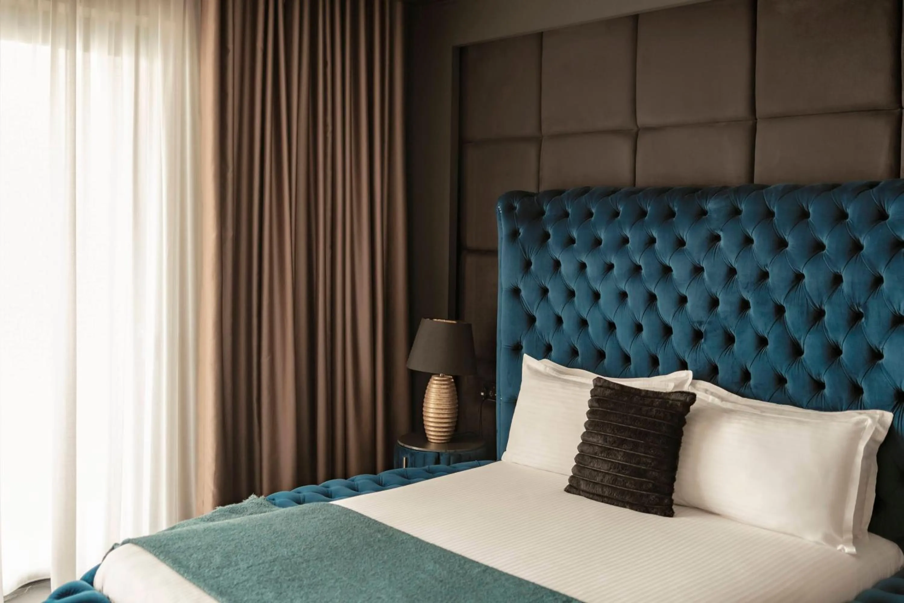 Bed in Damare Resort & SPA