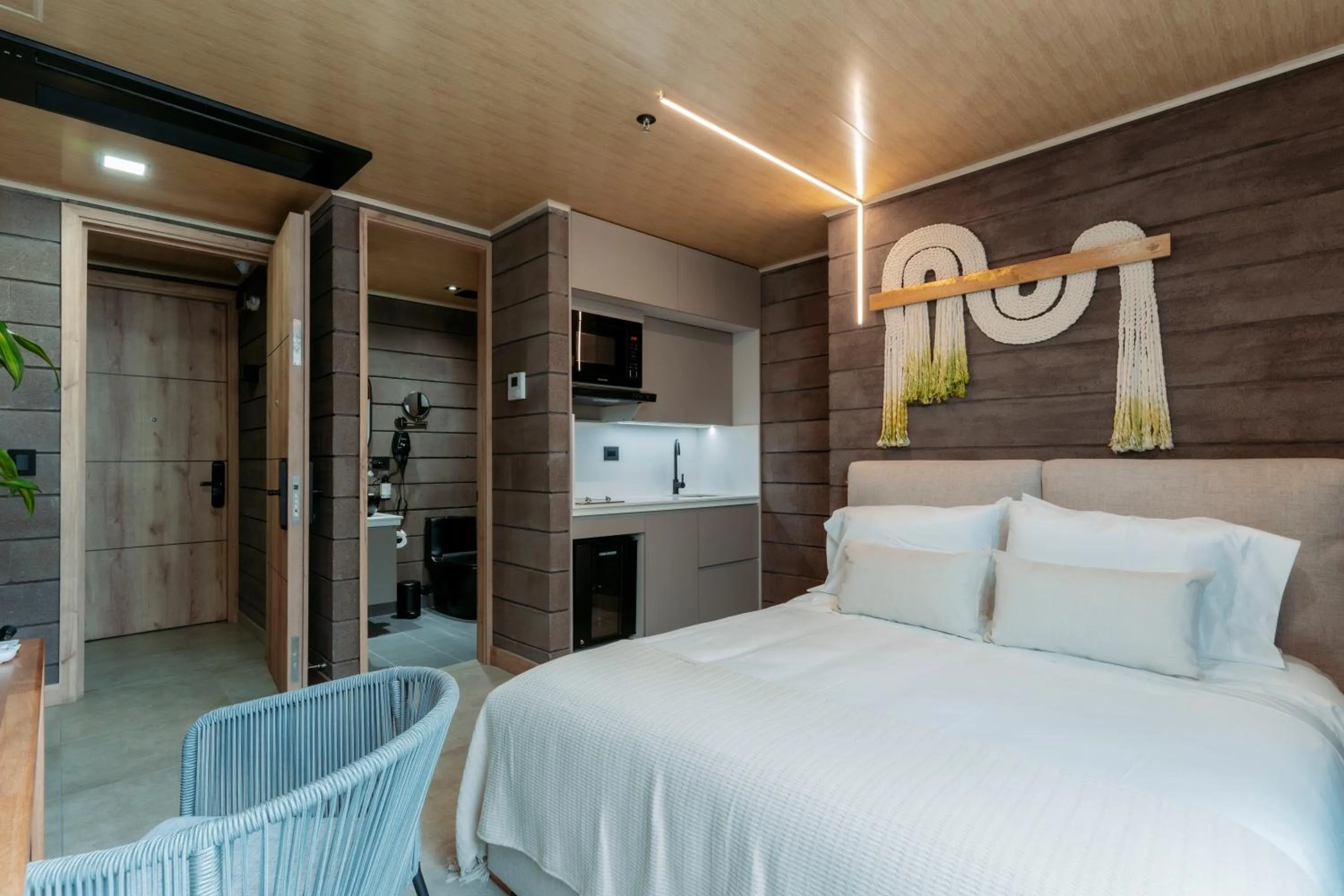 Bed in Hotel Living by Armoniko