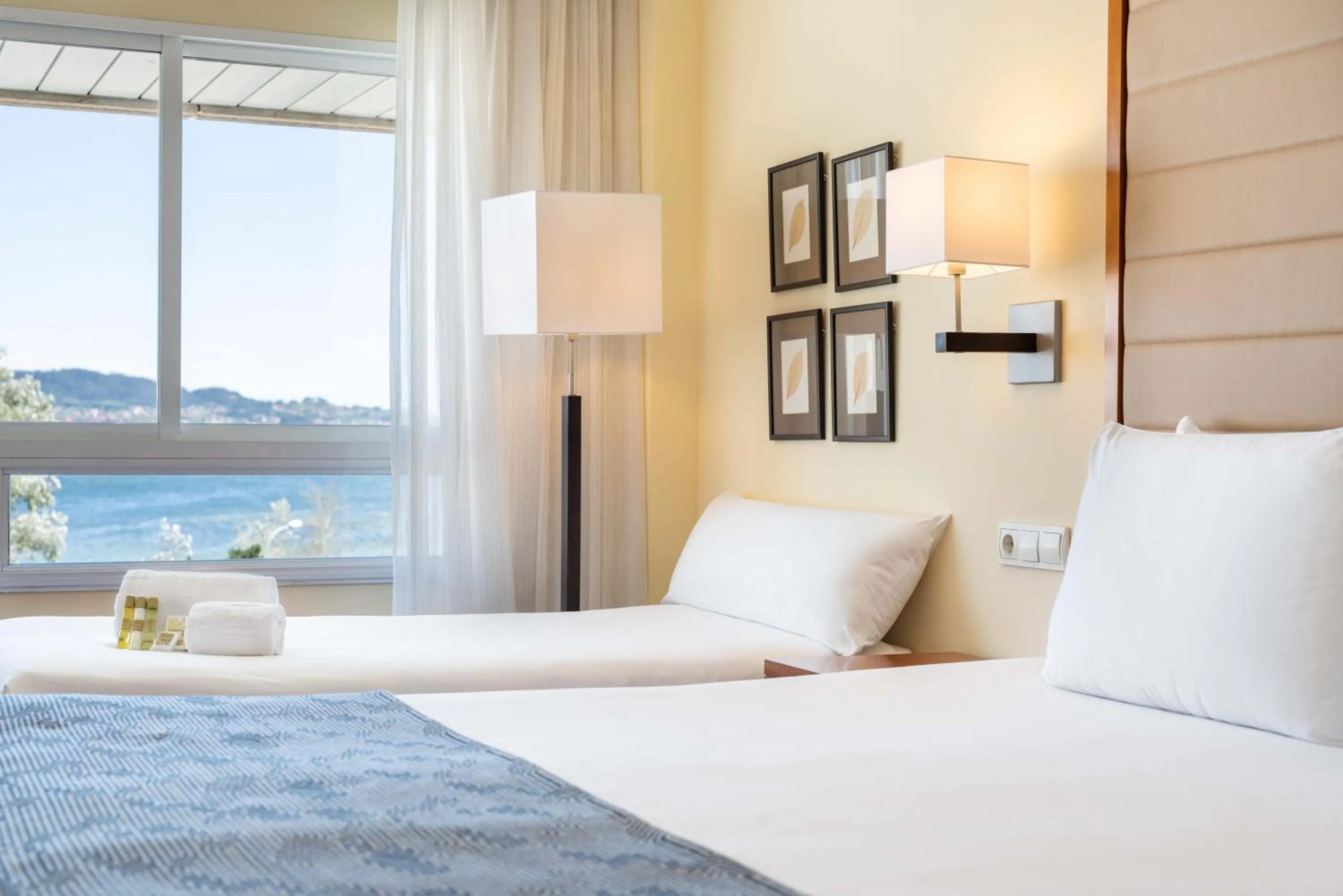 Bed in Eurostars Isla de La Toja