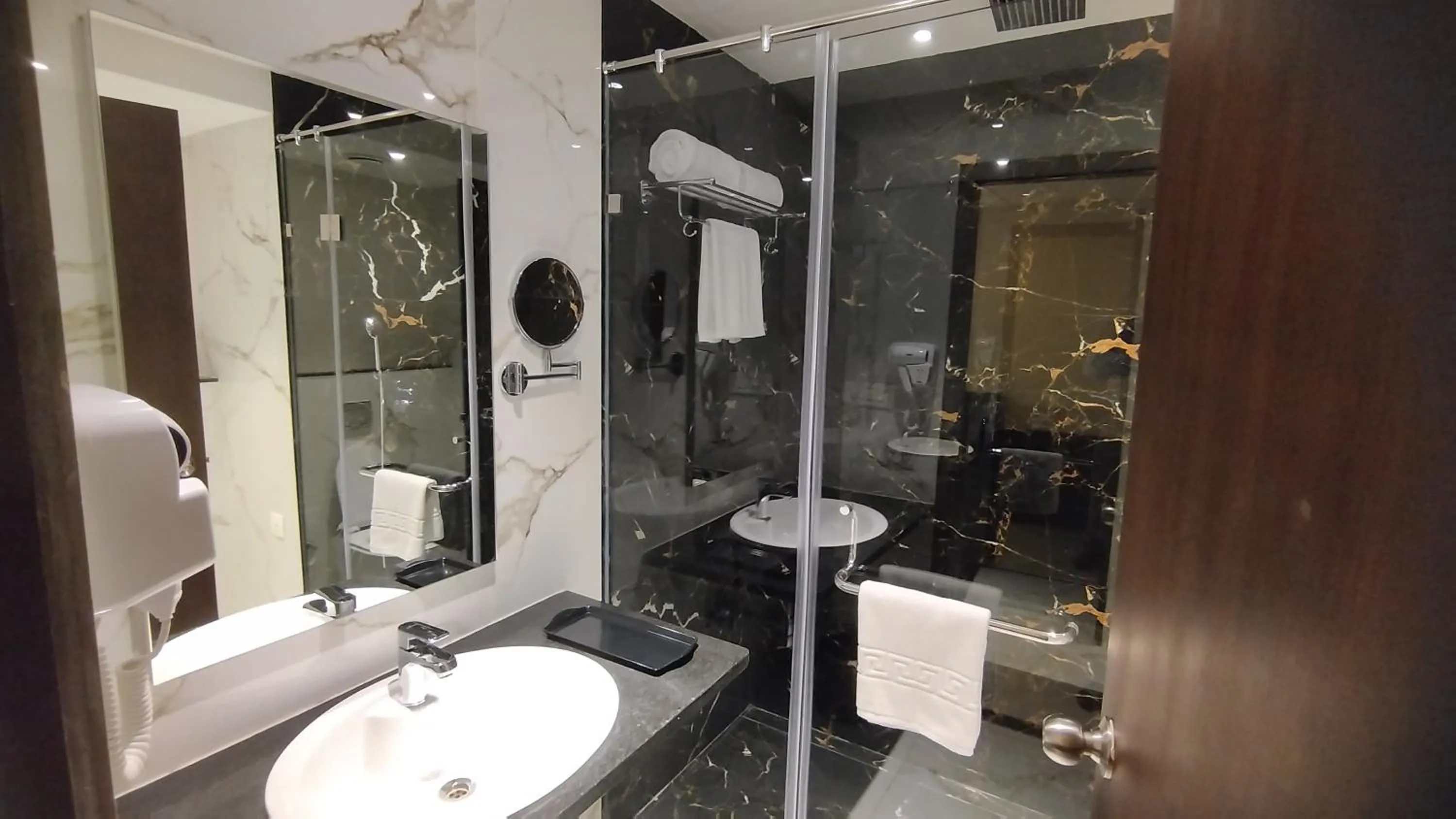 Bathroom in Mayur Belgaum Presidency Hotel & Spa